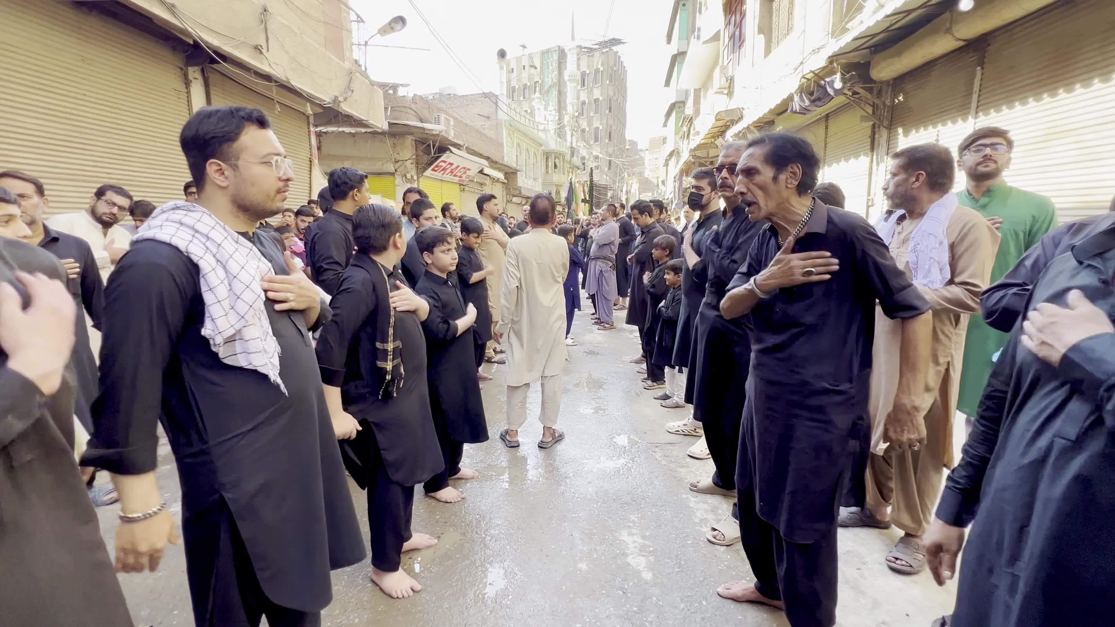 Shiite Muslim Mourners Participate in Religious Procession to Honor Imam Hussain (A.S.) and Remember the Martyrs of Karbala