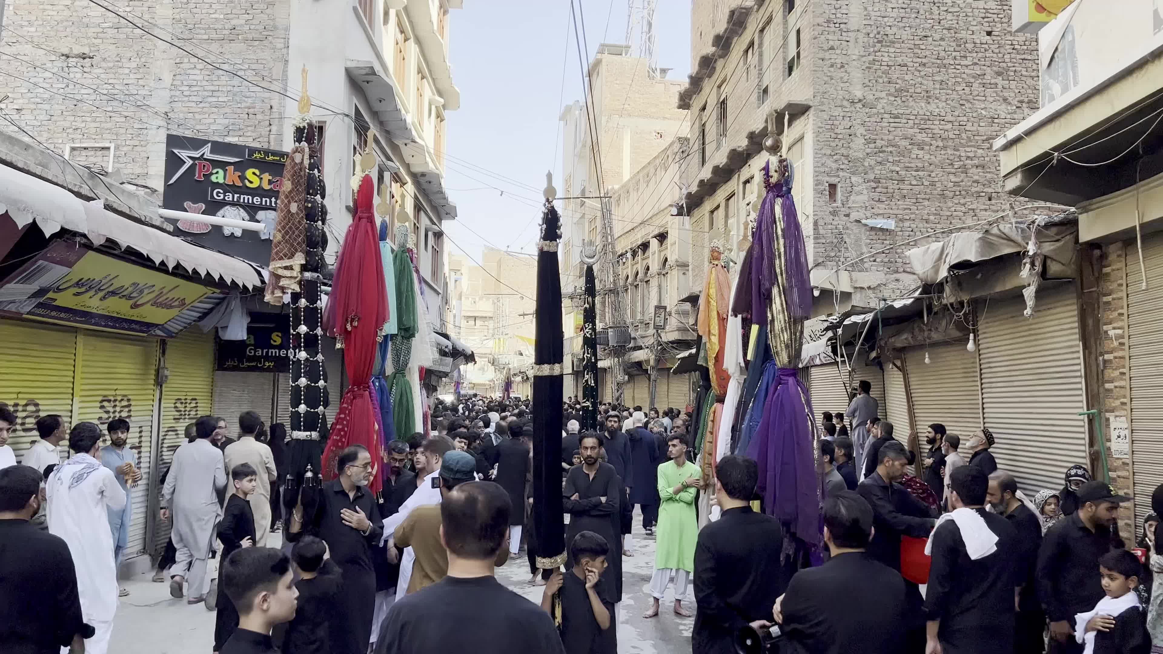 Shiite Muslim Mourners Participate in Religious Procession to Honor Imam Hussain (A.S.) and Remember the Martyrs of Karbala