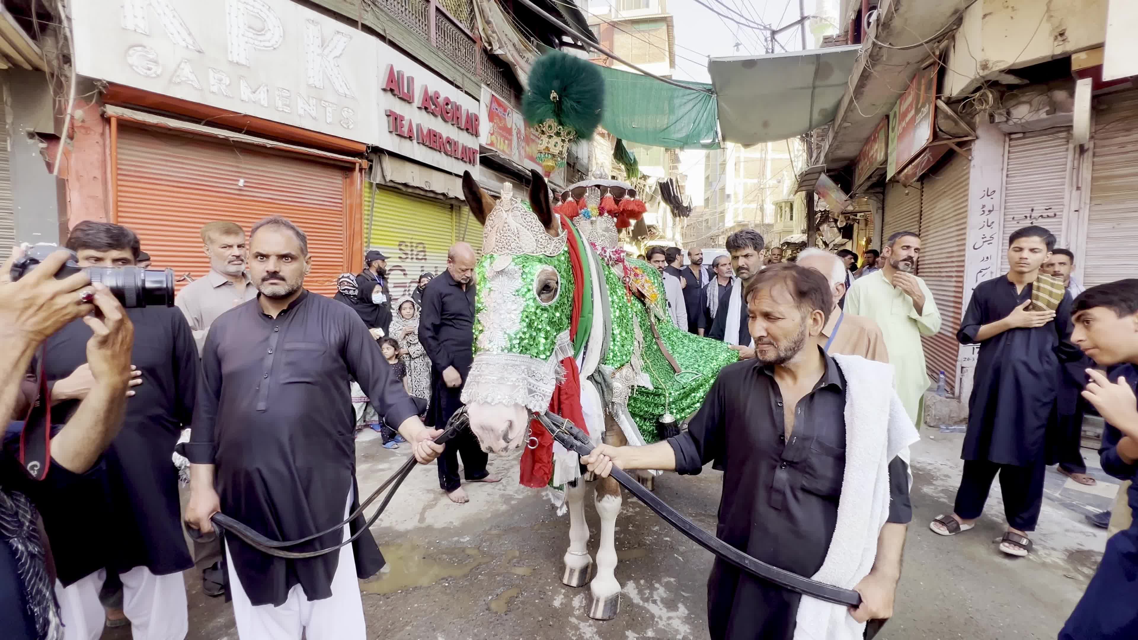 Shiite Muslim Mourners Participate in Religious Procession to Honor Imam Hussain (A.S.) and Remember the Martyrs of Karbala