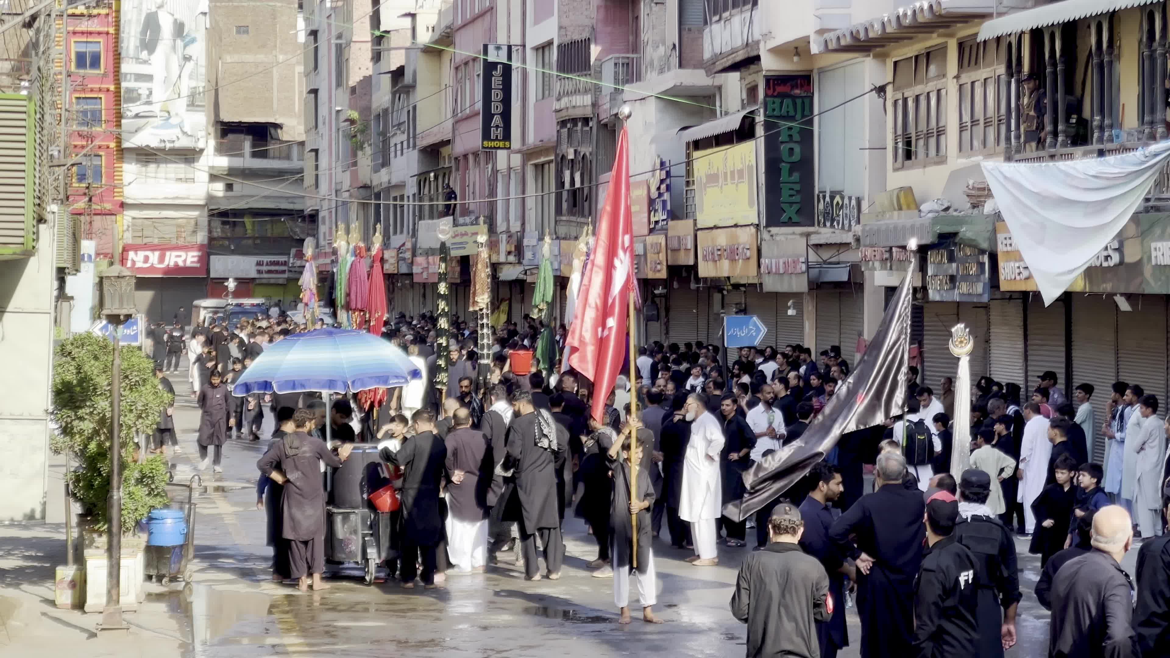 Shiite Muslim Mourners Participate in Religious Procession to Honor Imam Hussain (A.S.) and Remember the Martyrs of Karbala