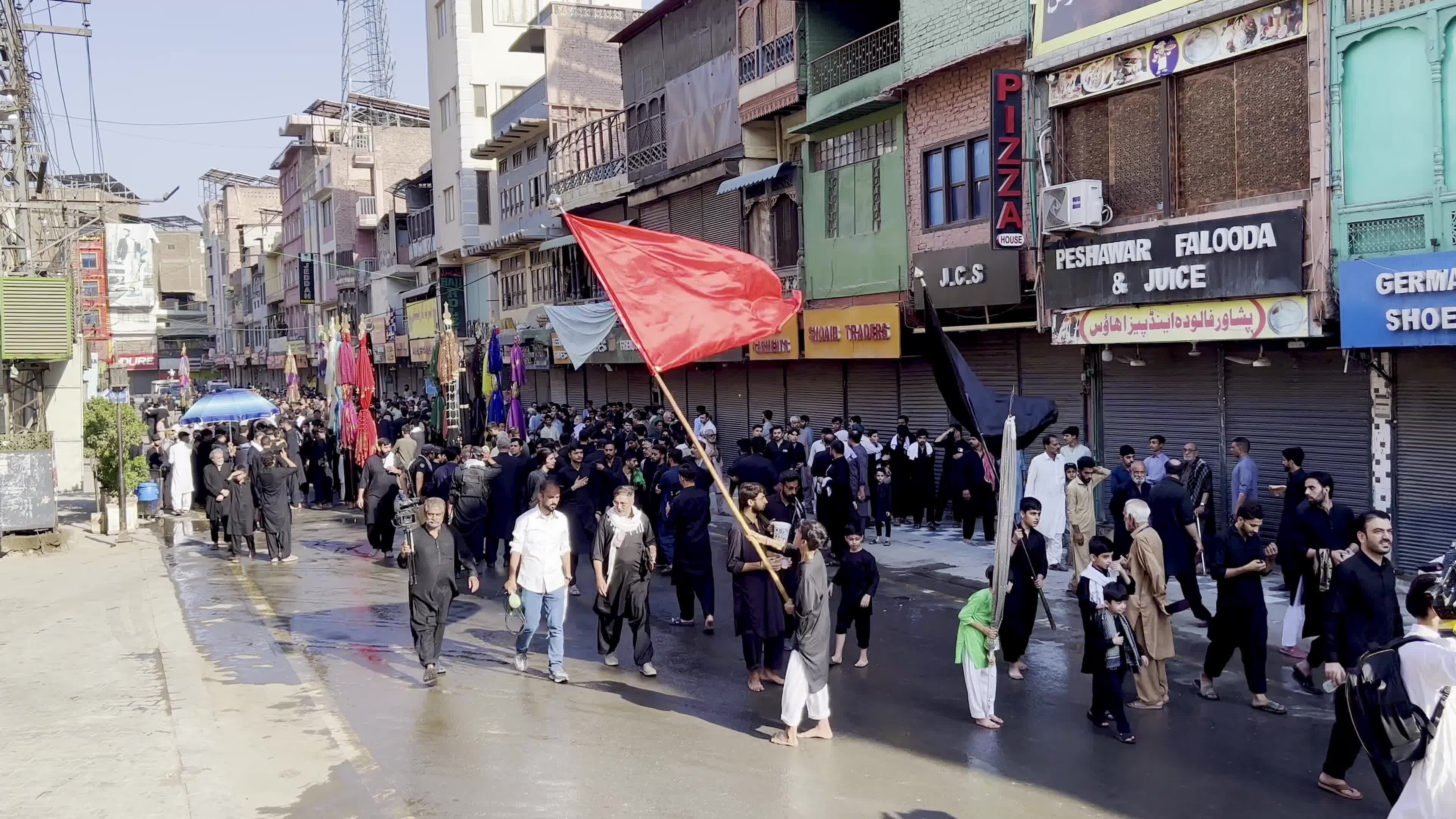 Shiite Muslim Mourners Participate in Religious Procession to Honor Imam Hussain (A.S.) and Remember the Martyrs of Karbala
