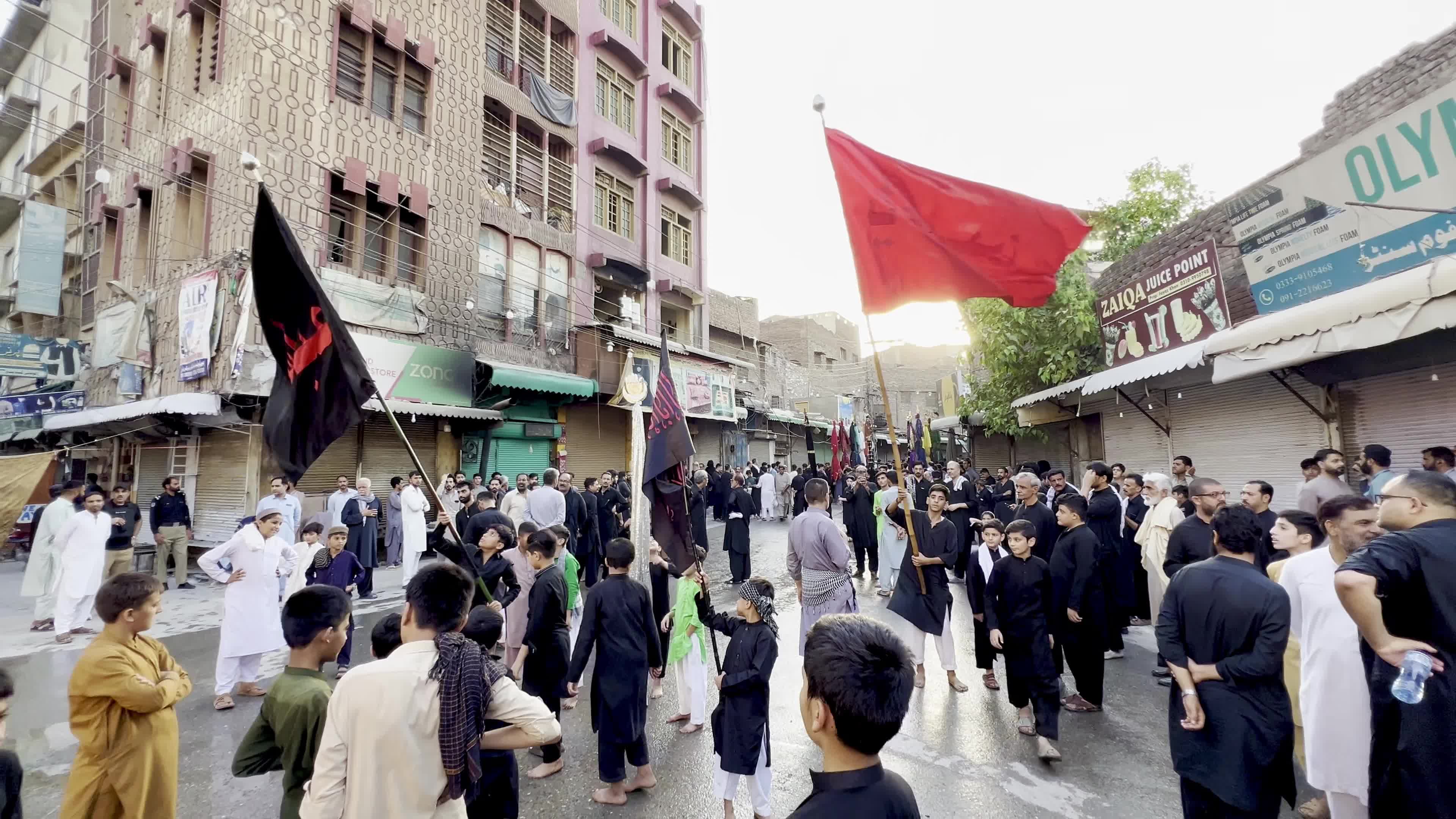 Shiite Muslim Mourners Participate in Religious Procession to Honor Imam Hussain (A.S.) and Remember the Martyrs of Karbala