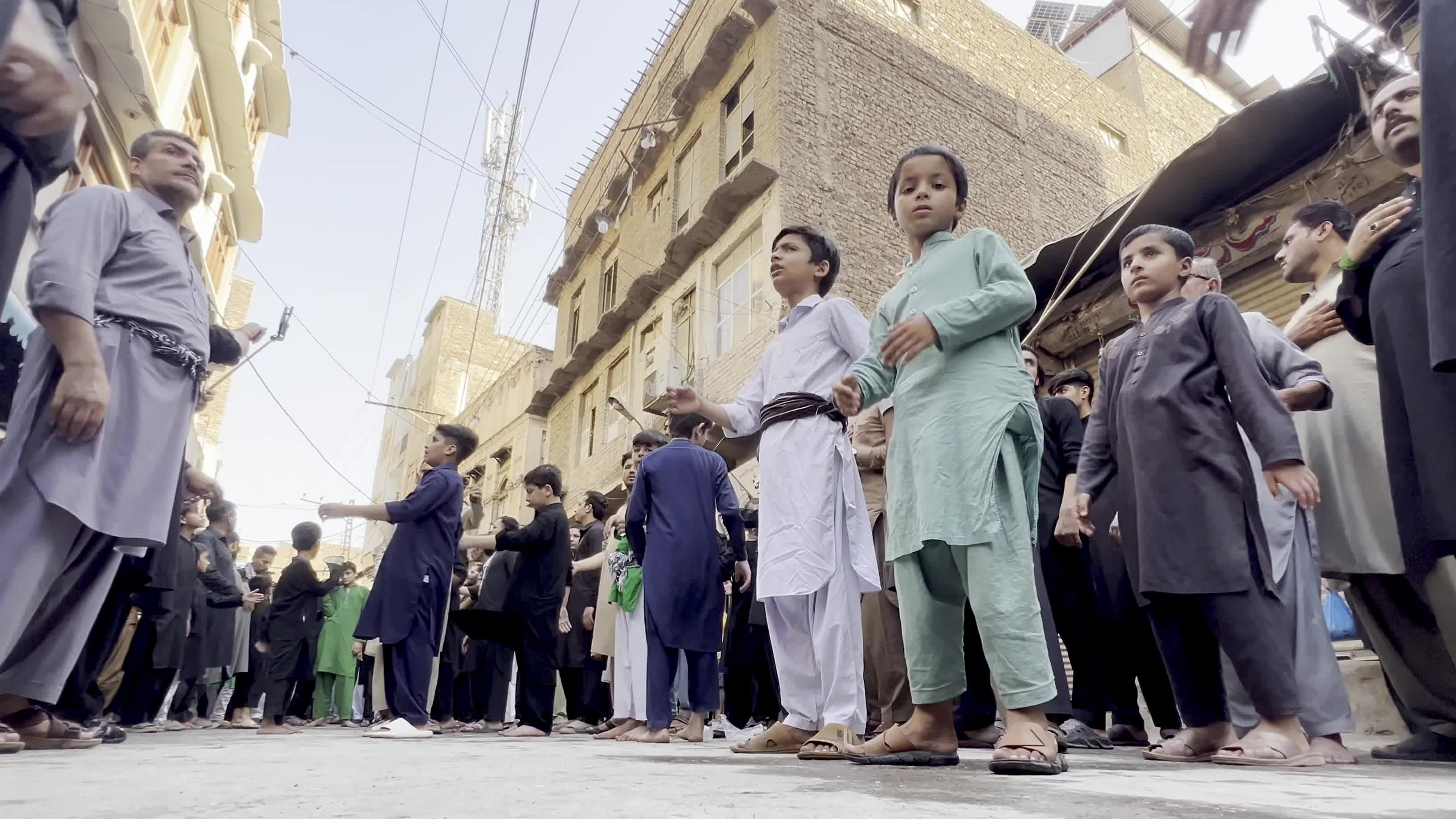 Shiite Muslim Mourners Participate in Religious Procession to Honor Imam Hussain (A.S.) and Remember the Martyrs of Karbala