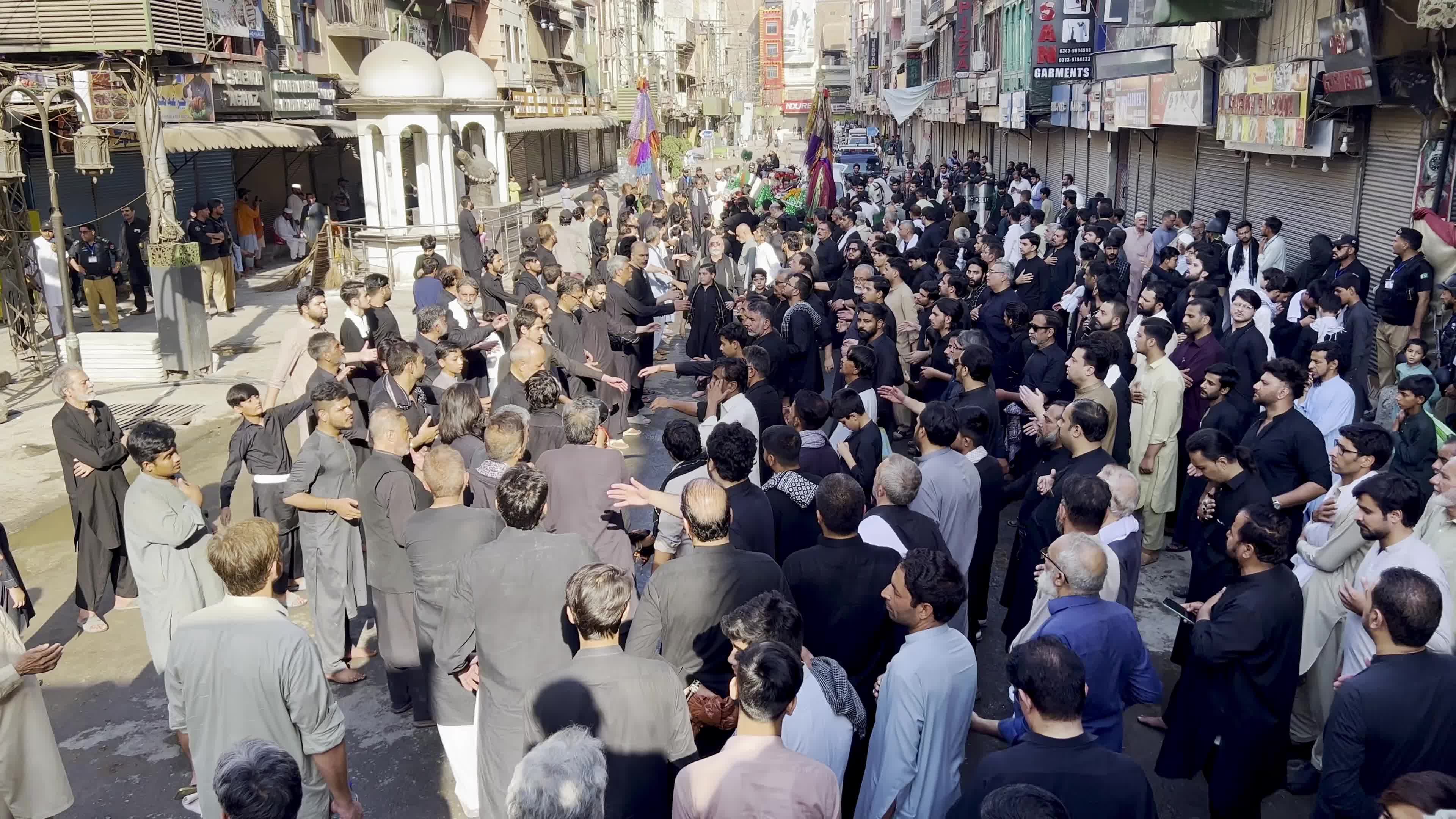 Shiite Muslim Mourners Participate in Religious Procession to Honor Imam Hussain (A.S.) and Remember the Martyrs of Karbala