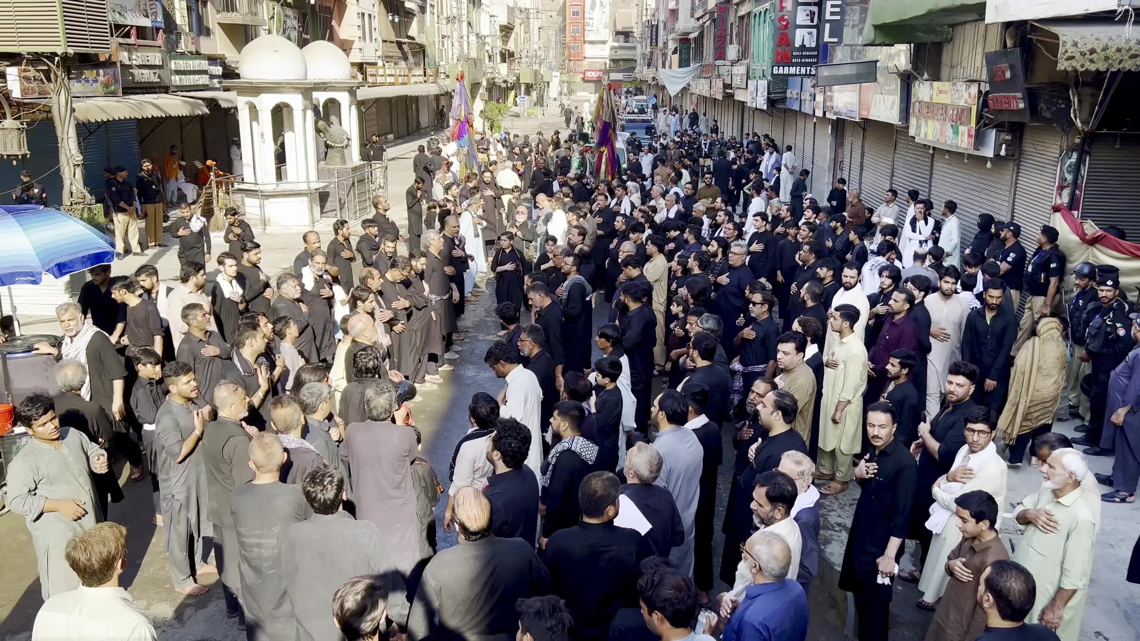 Shiite Muslim Mourners Participate in Religious Procession to Honor Imam Hussain (A.S.) and Remember the Martyrs of Karbala