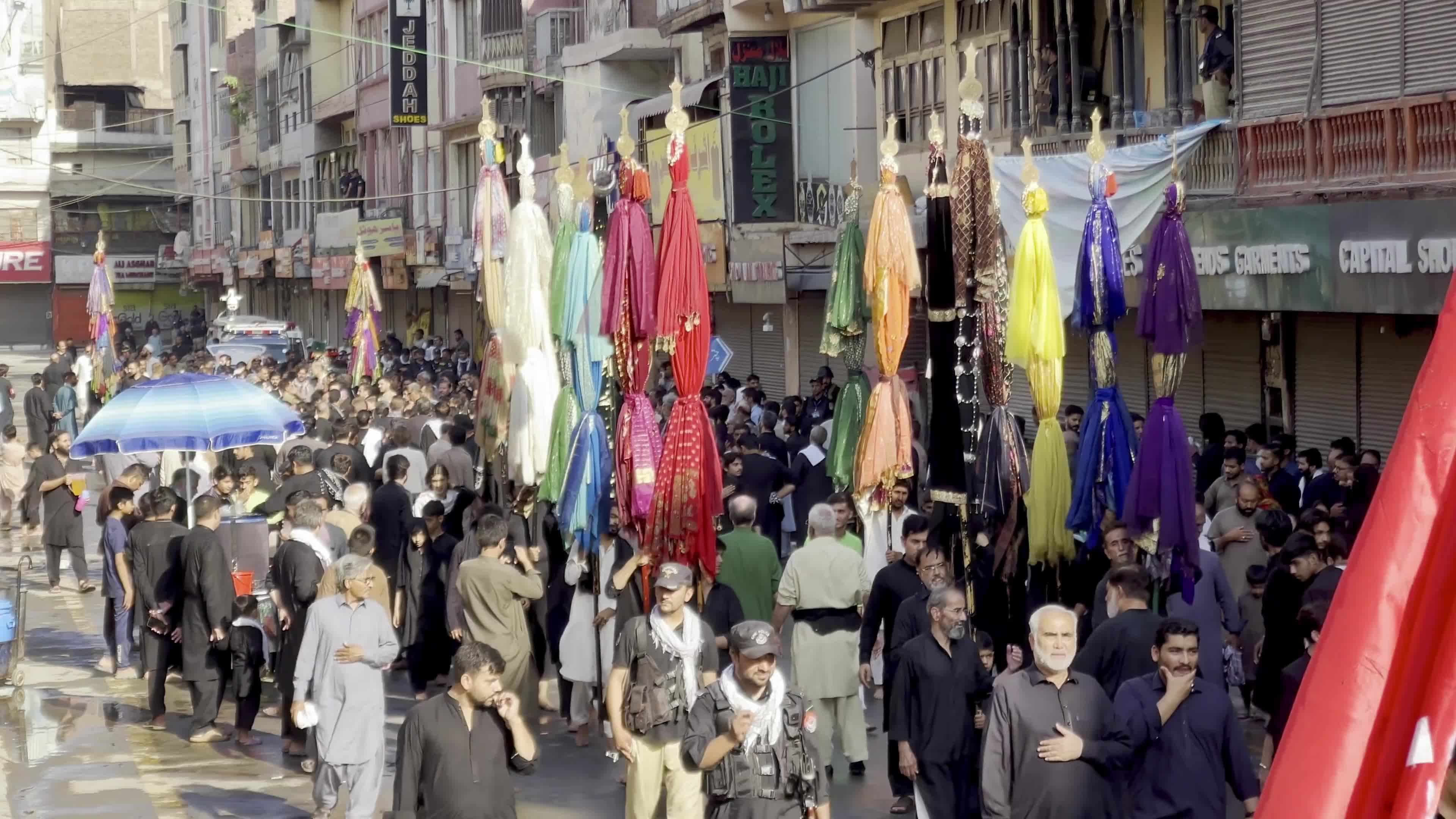 Shiite Muslim Mourners Participate in Religious Procession to Honor Imam Hussain (A.S.) and Remember the Martyrs of Karbala