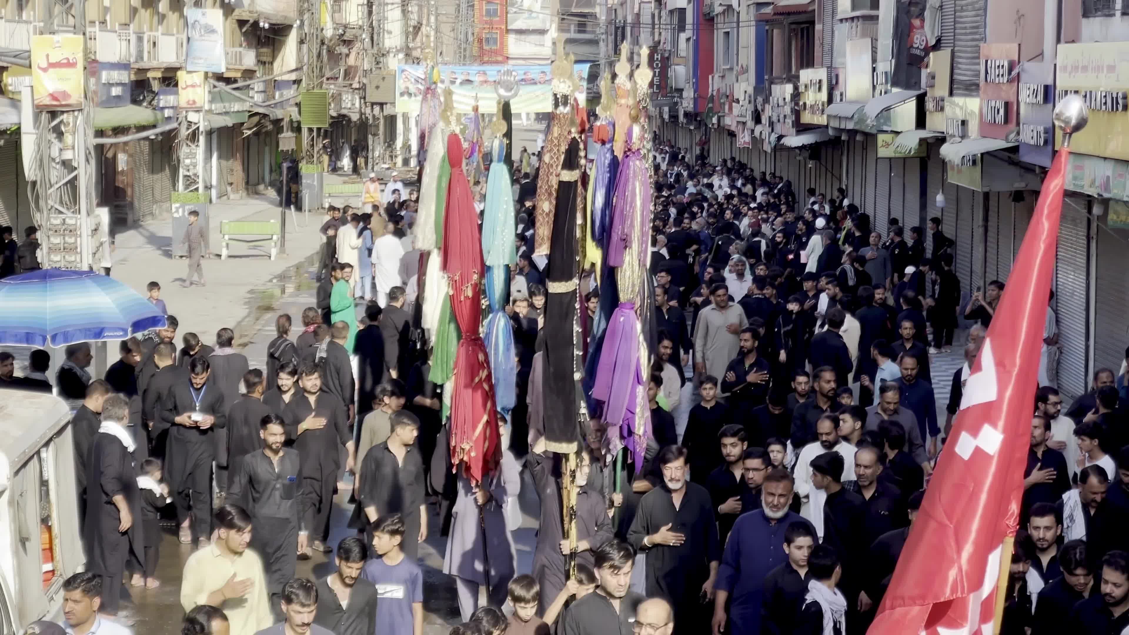 Shiite Muslim Mourners Participate in Religious Procession to Honor Imam Hussain (A.S.) and Remember the Martyrs of Karbala