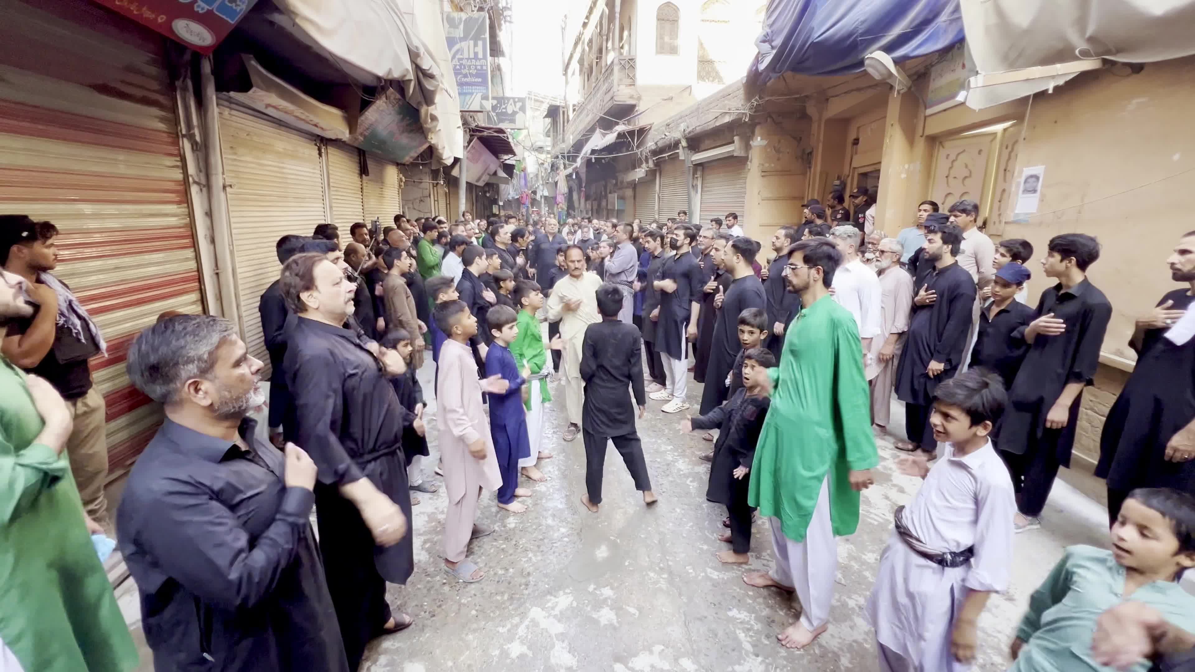 Shiite Muslim Mourners Participate in Religious Procession to Honor Imam Hussain (A.S.) and Remember the Martyrs of Karbala
