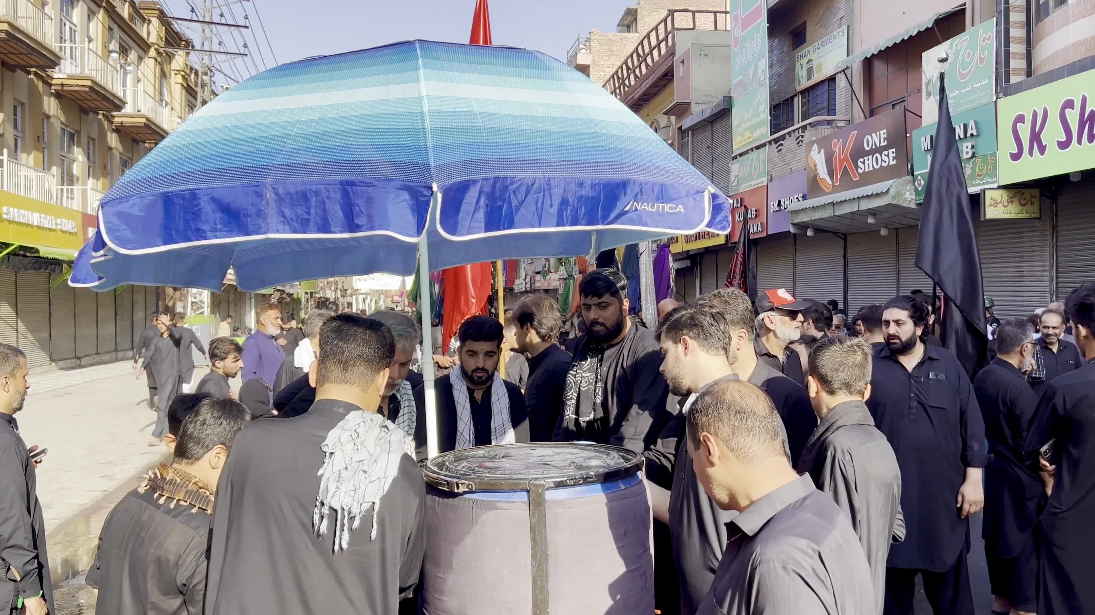 Shiite Muslim Mourners Participate in Religious Procession to Honor Imam Hussain (A.S.) and Remember the Martyrs of Karbala