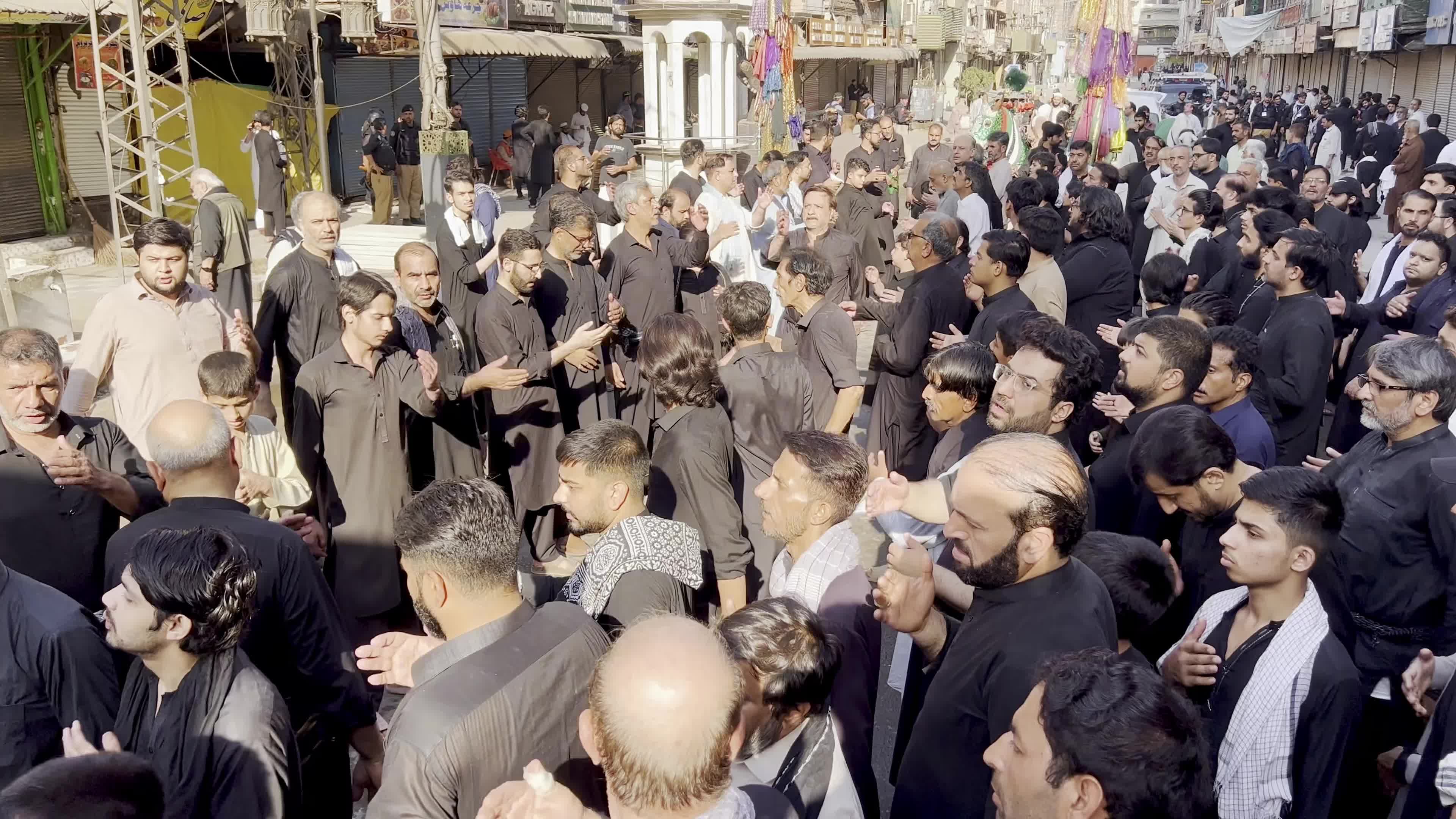Shiite Muslim Mourners Participate in Religious Procession to Honor Imam Hussain (A.S.) and Remember the Martyrs of Karbala