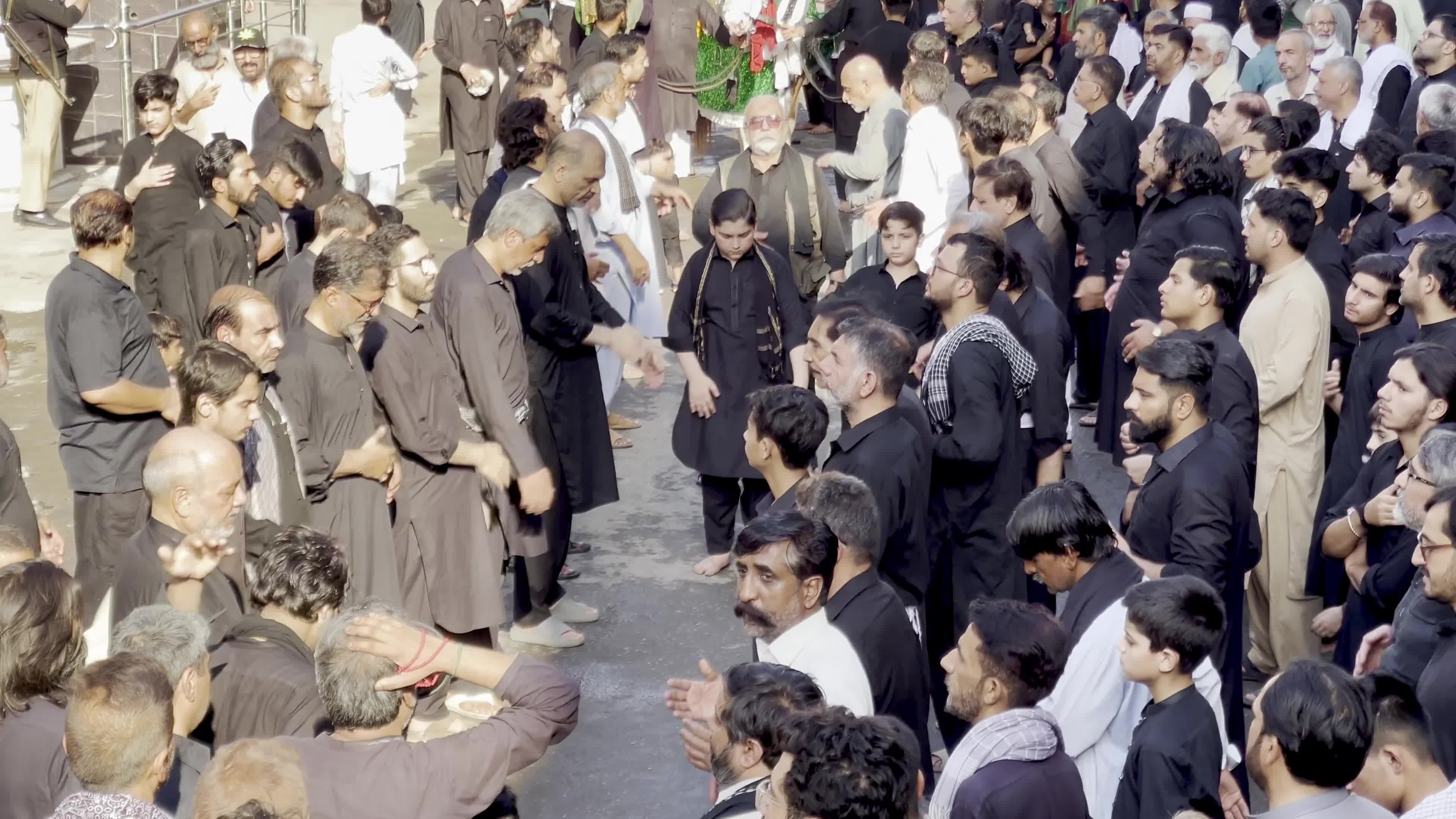 Shiite Muslim Mourners Participate in Religious Procession to Honor Imam Hussain (A.S.) and Remember the Martyrs of Karbala