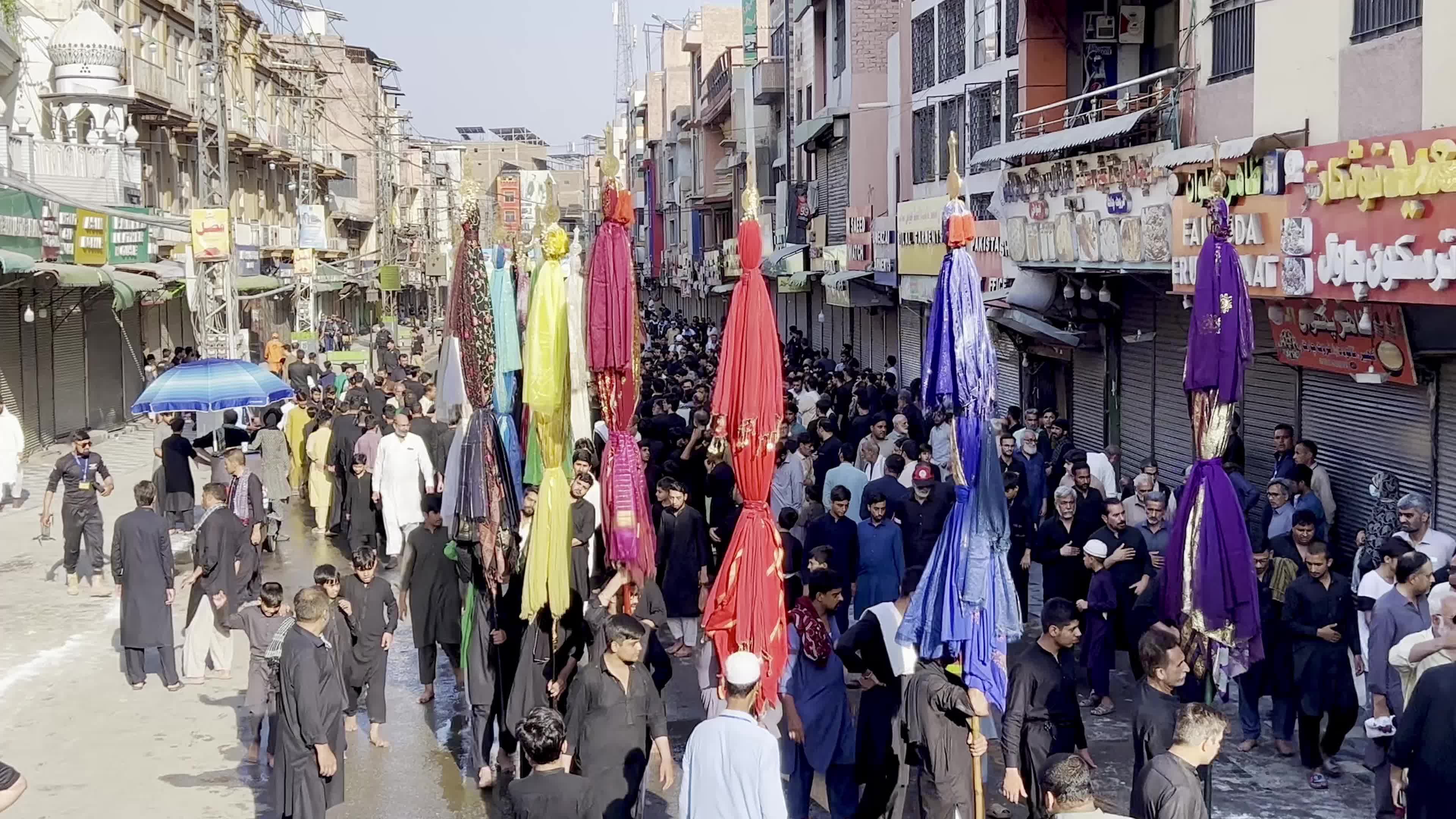 Shiite Muslim Mourners Participate in Religious Procession to Honor Imam Hussain (A.S.) and Remember the Martyrs of Karbala