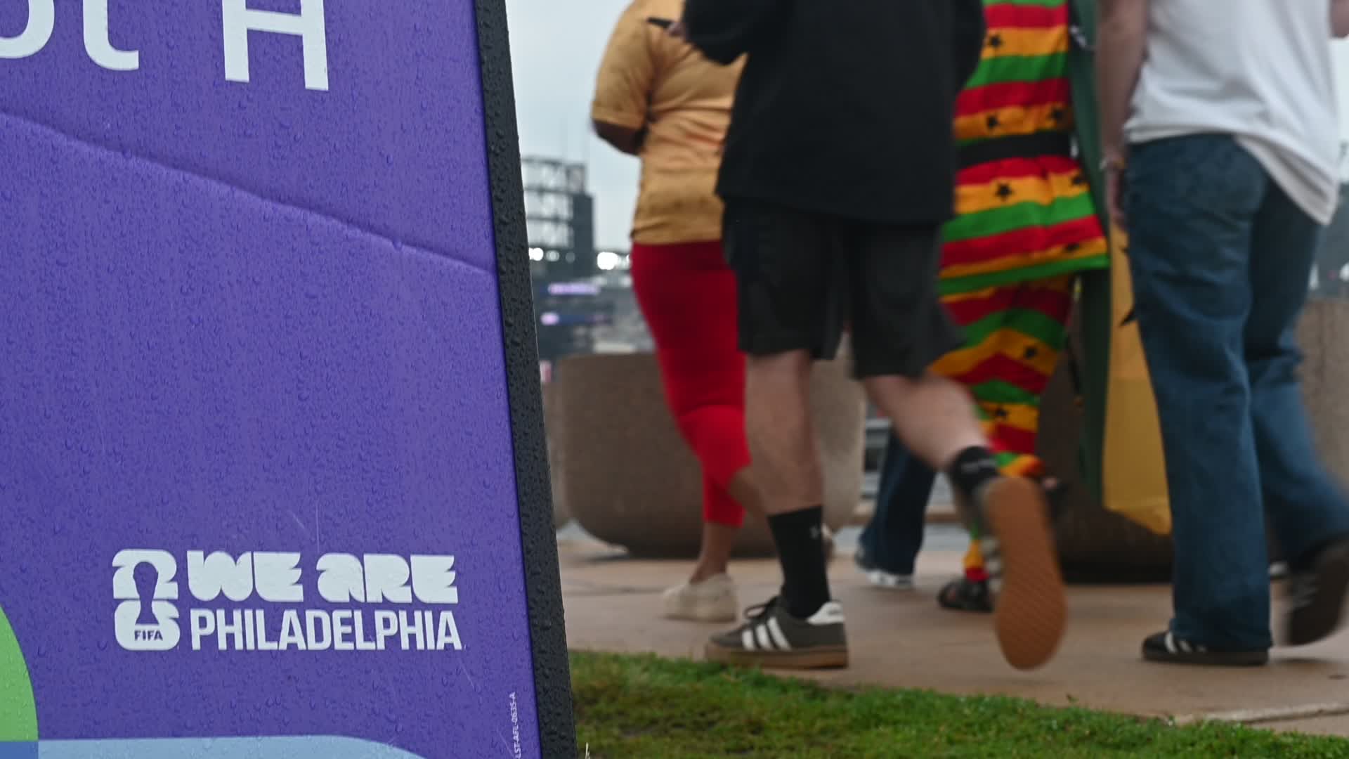 Football Supporter Arrive at Philadelphia Stadium on a Rainy Day
