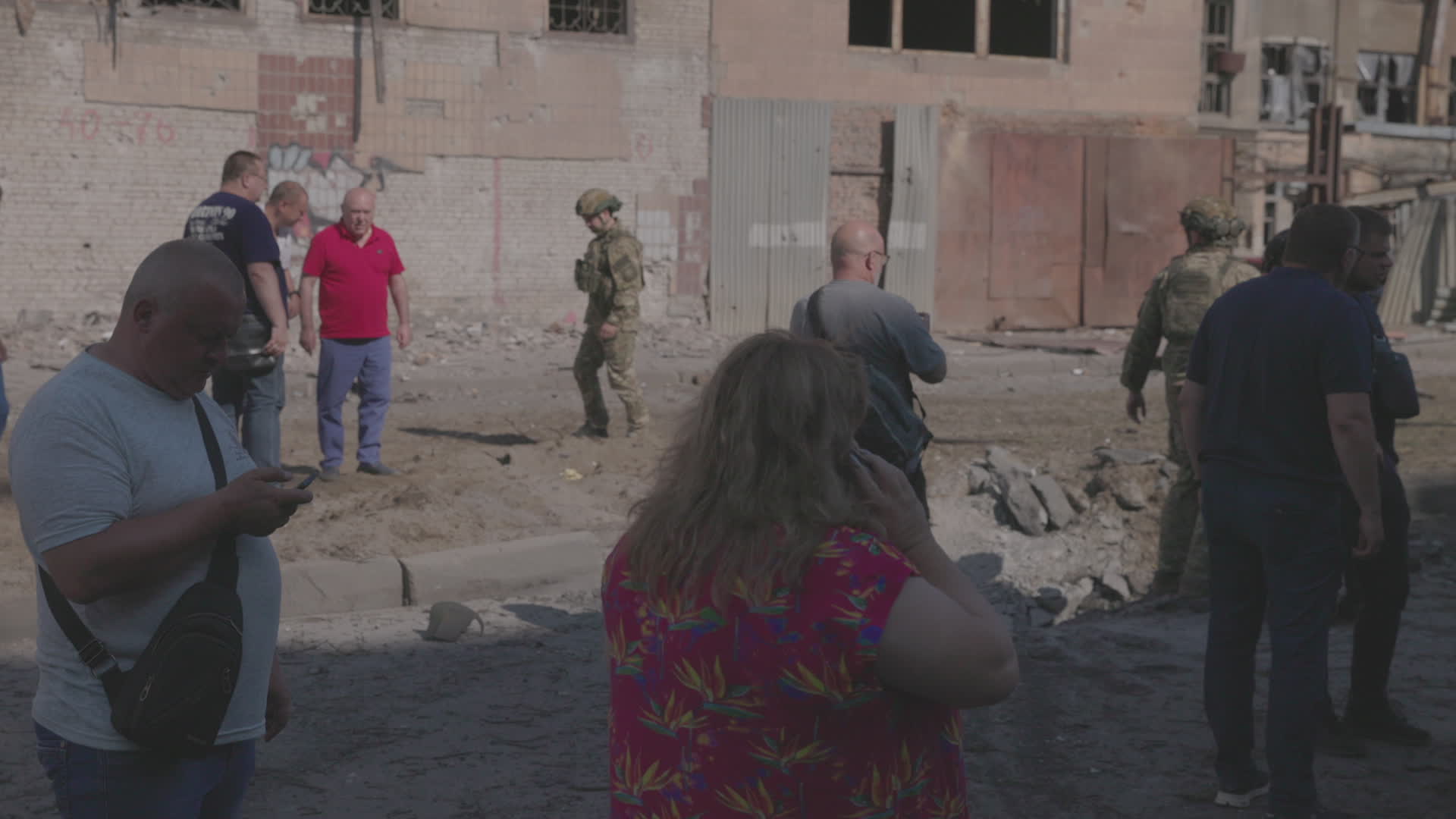 Ukrainian emergency responders work at scene of attack in Kharkiv that killed one, wounded ten