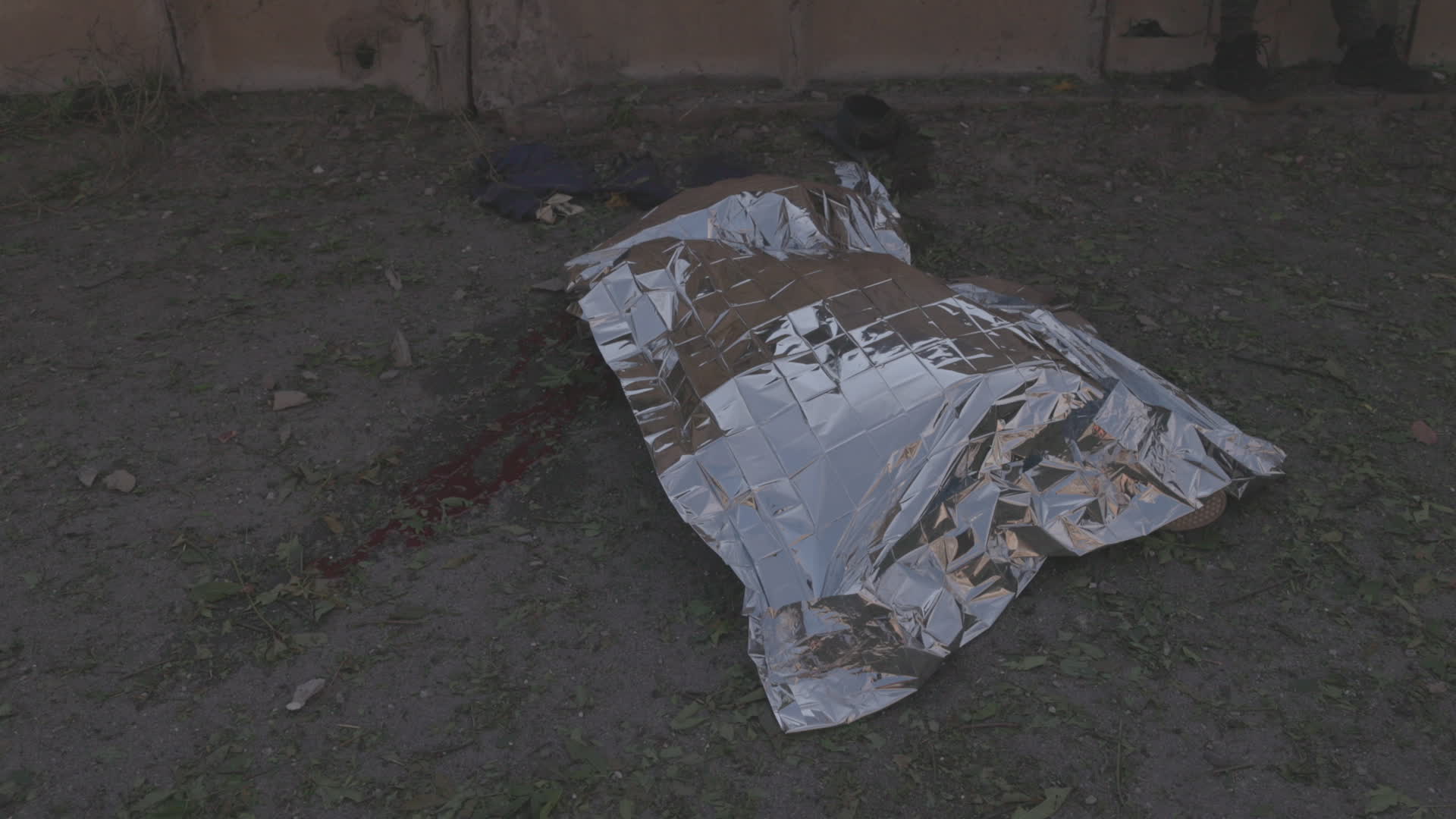 Ukrainian emergency responders work at scene of attack in Kharkiv that killed one, wounded ten