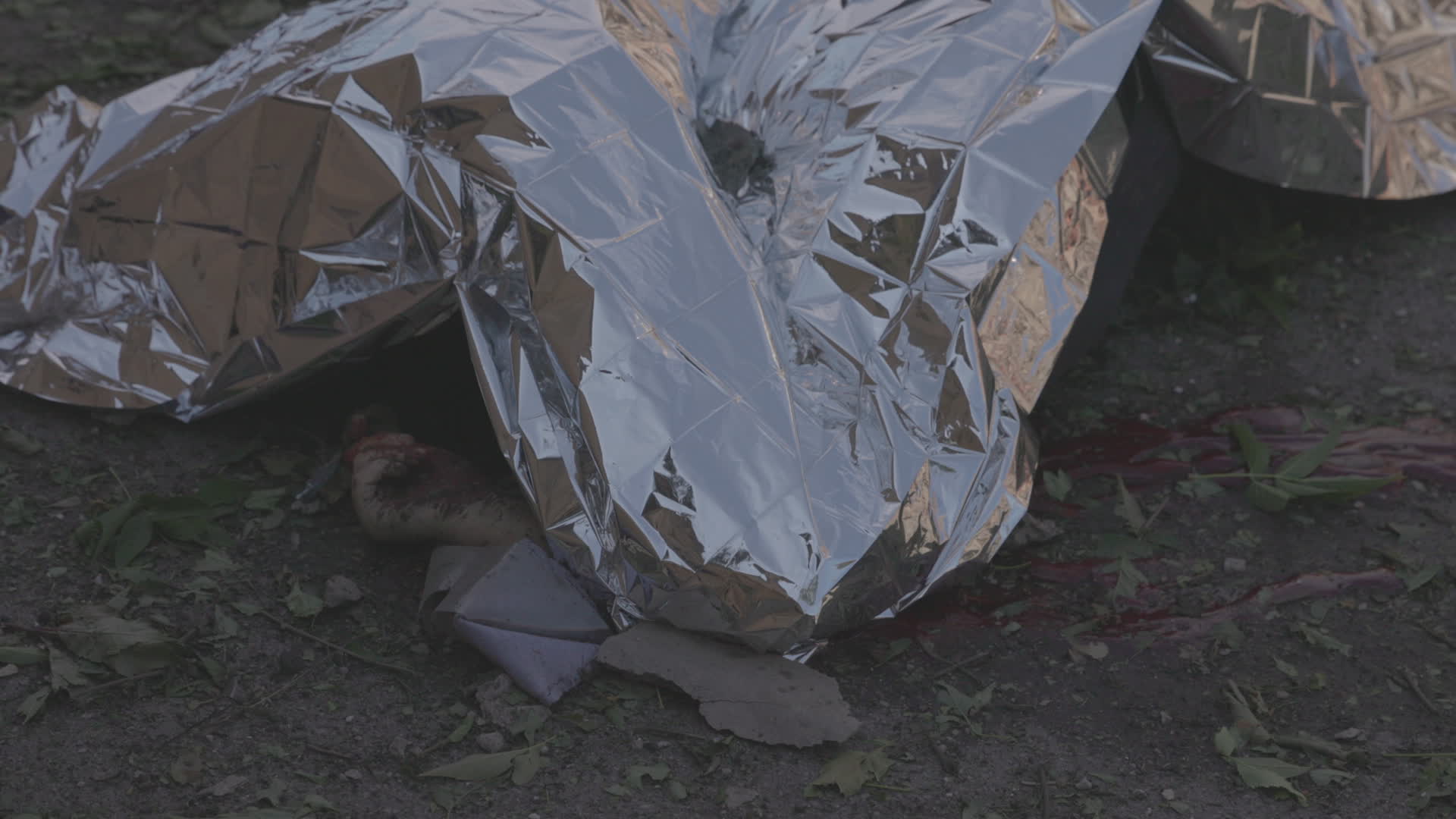Ukrainian emergency responders work at scene of attack in Kharkiv that killed one, wounded ten