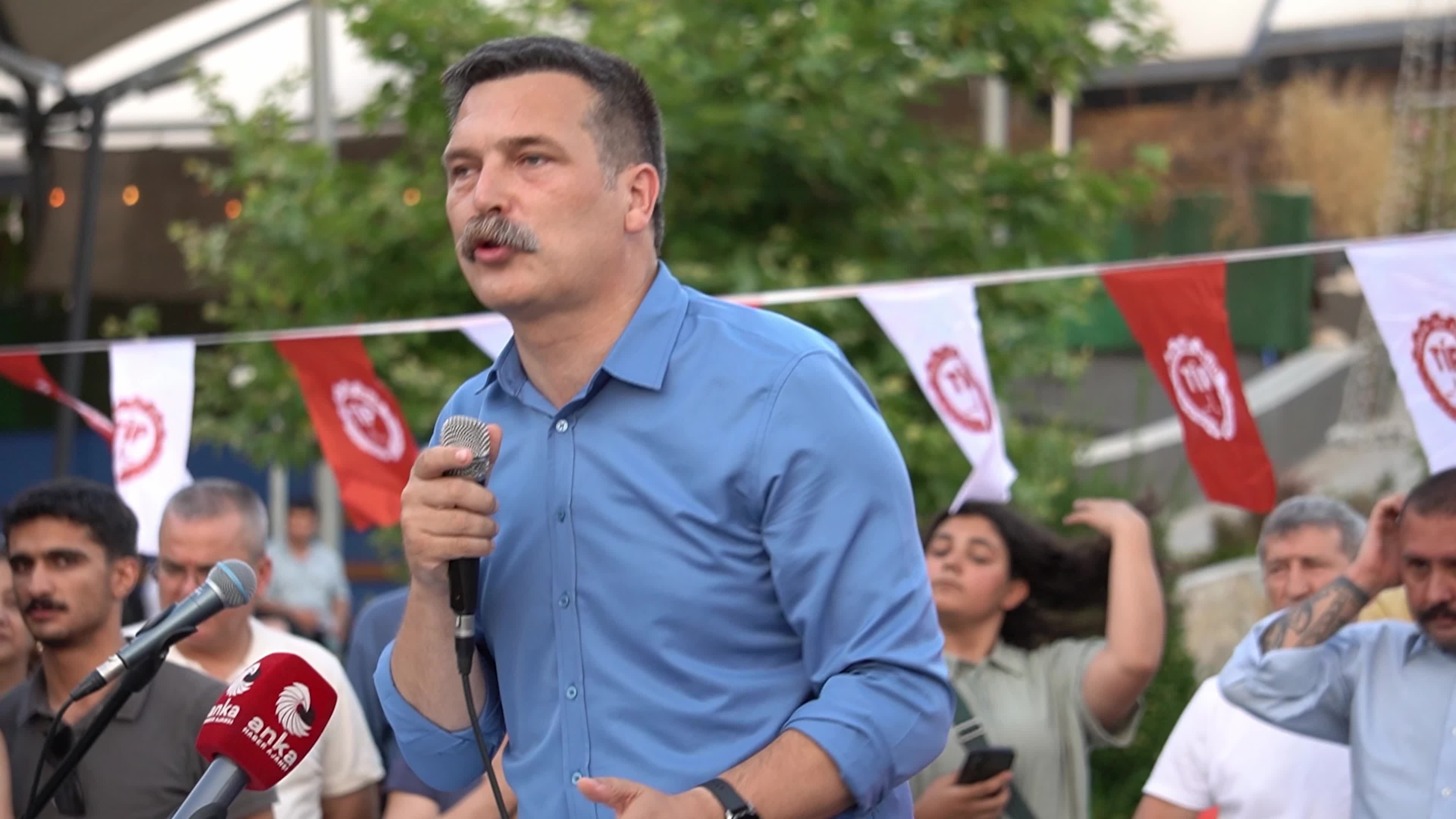 Erkan Bas, Chairman of the Workers' Party of Turkey (TIP), attends a public forum