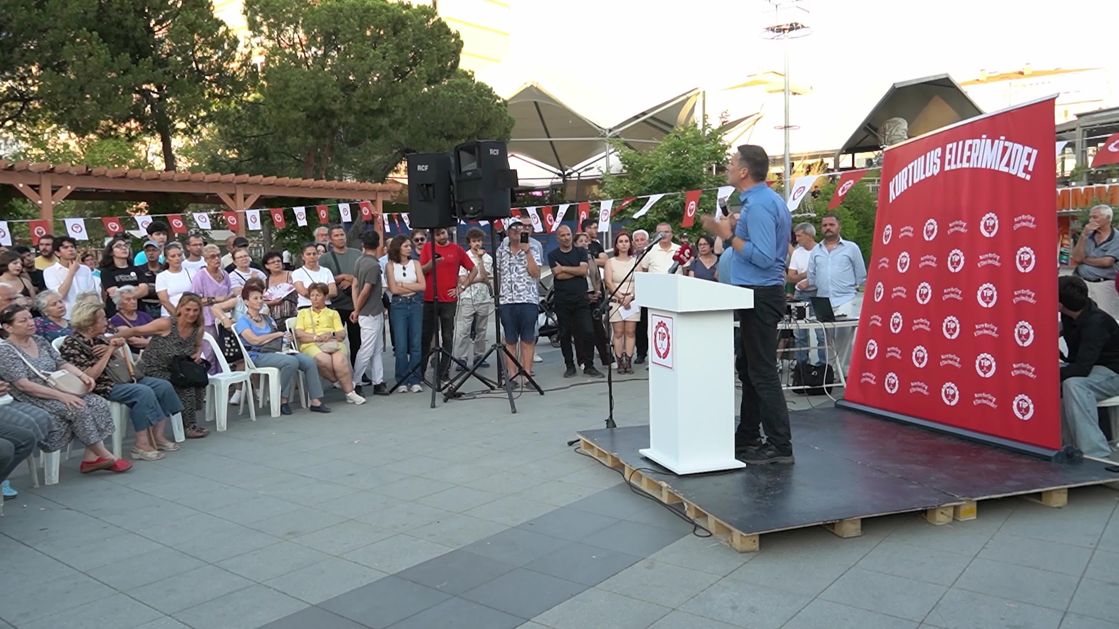 Erkan Bas, Chairman of the Workers' Party of Turkey (TIP), attends a public forum