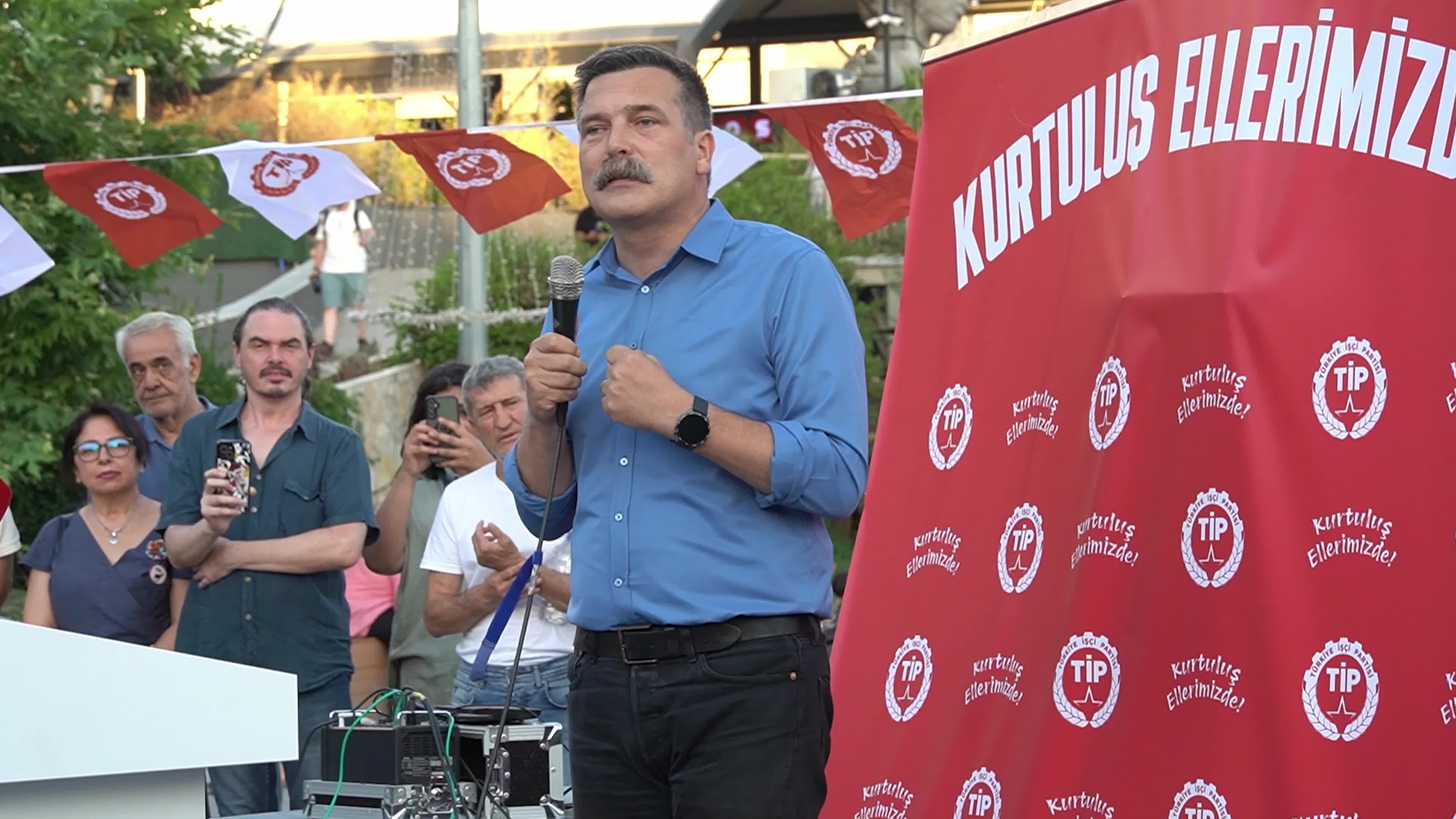 Erkan Bas, Chairman of the Workers' Party of Turkey (TIP), attends a public forum