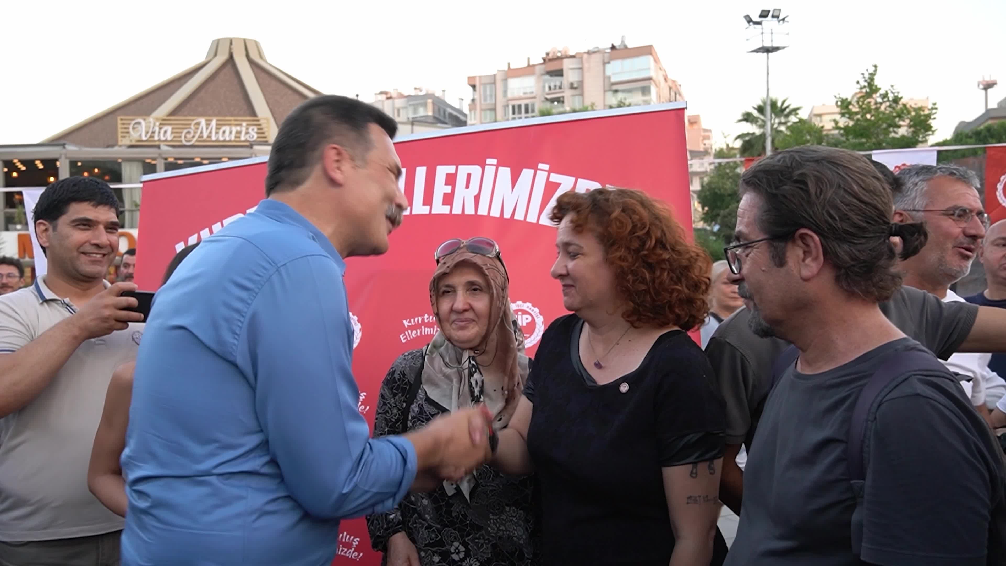 Erkan Bas, Chairman of the Workers' Party of Turkey (TIP), attends a public forum