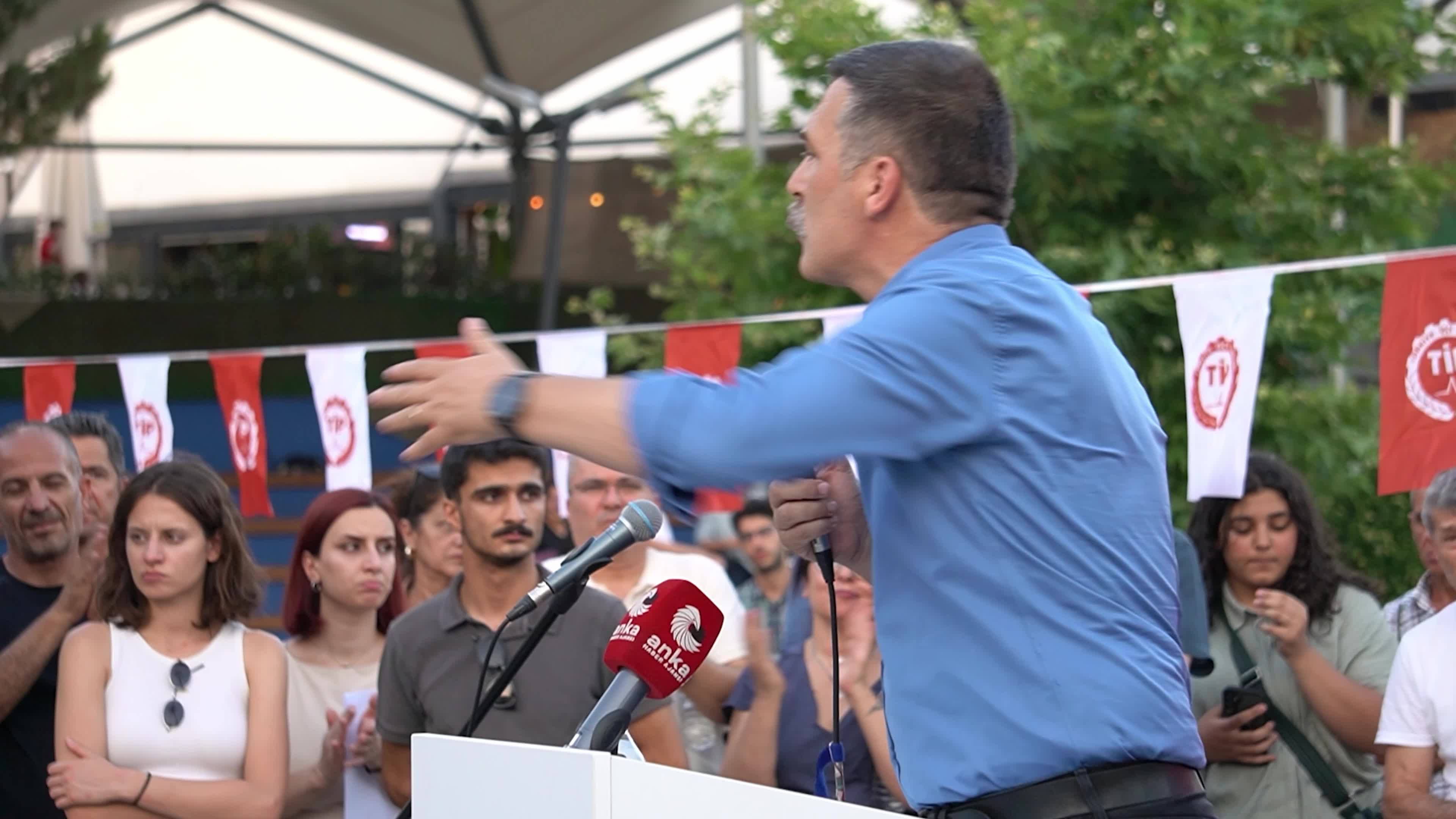 Erkan Bas, Chairman of the Workers' Party of Turkey (TIP), attends a public forum