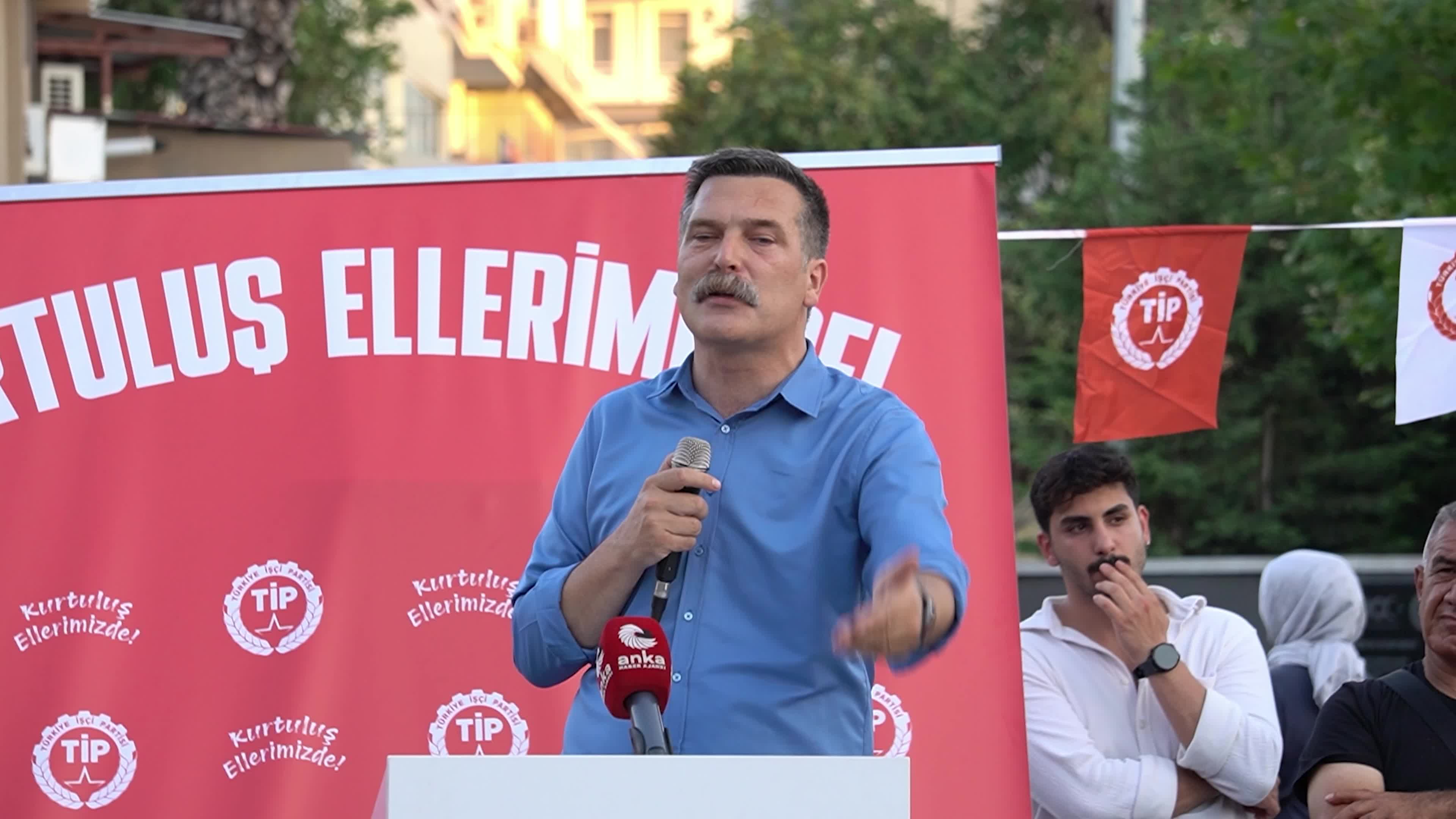 Erkan Bas, Chairman of the Workers' Party of Turkey (TIP), attends a public forum