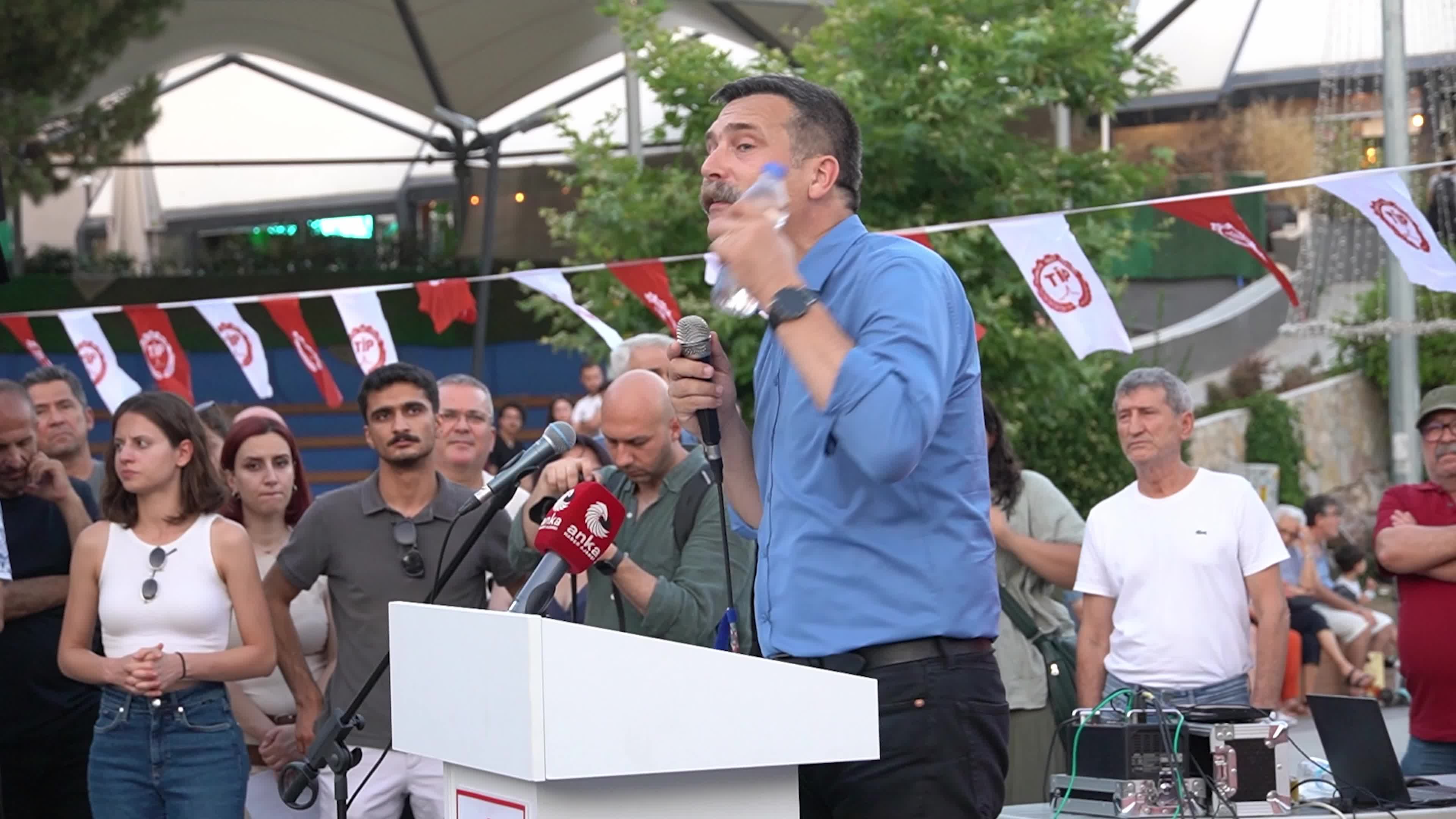 Erkan Bas, Chairman of the Workers' Party of Turkey (TIP), attends a public forum