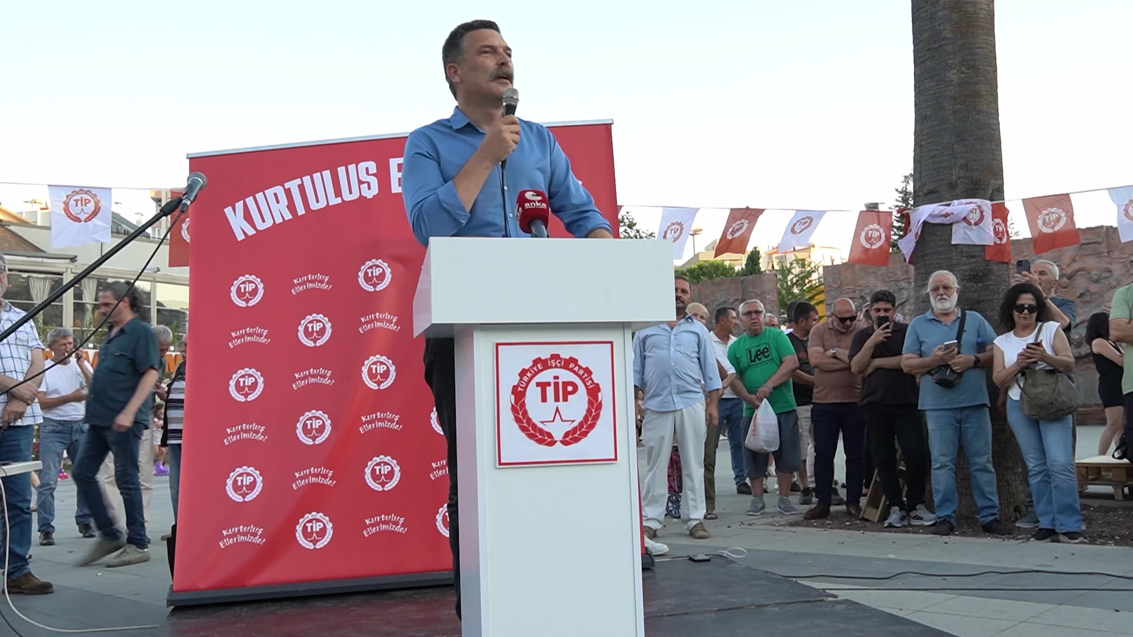 Erkan Bas, Chairman of the Workers' Party of Turkey (TIP), attends a public forum