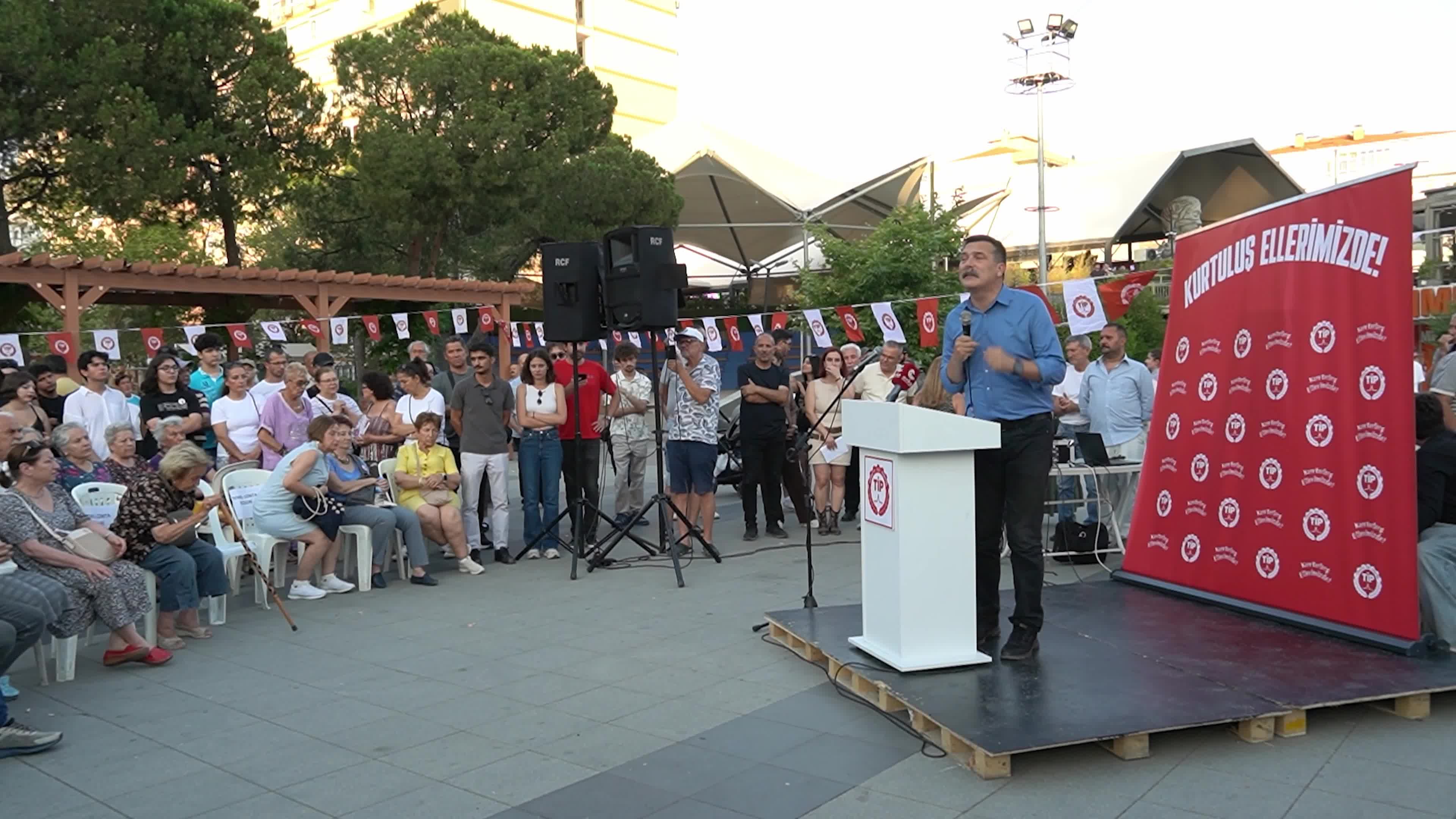 Erkan Bas, Chairman of the Workers' Party of Turkey (TIP), attends a public forum