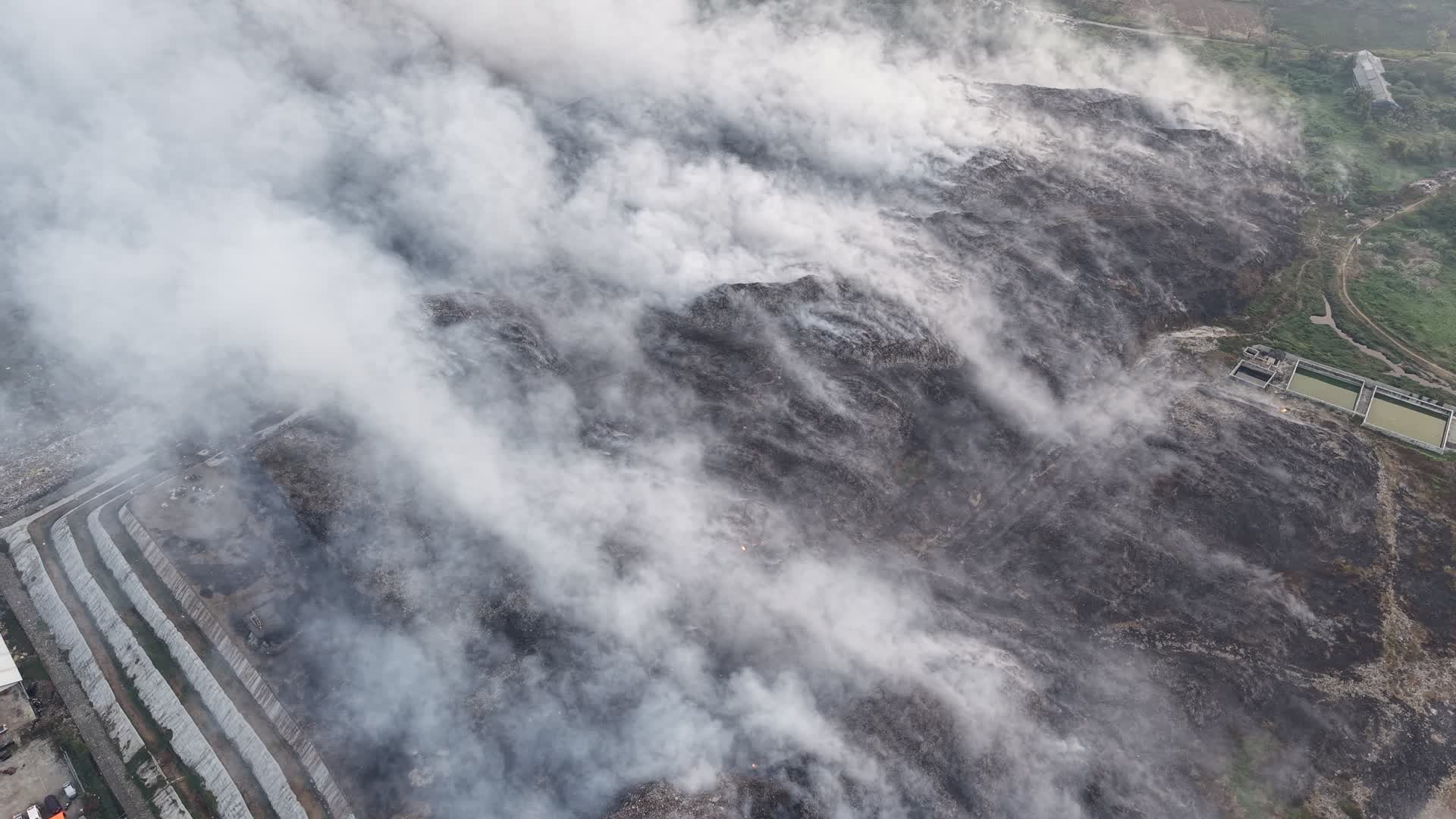 fire of big landfill in Indonesia
