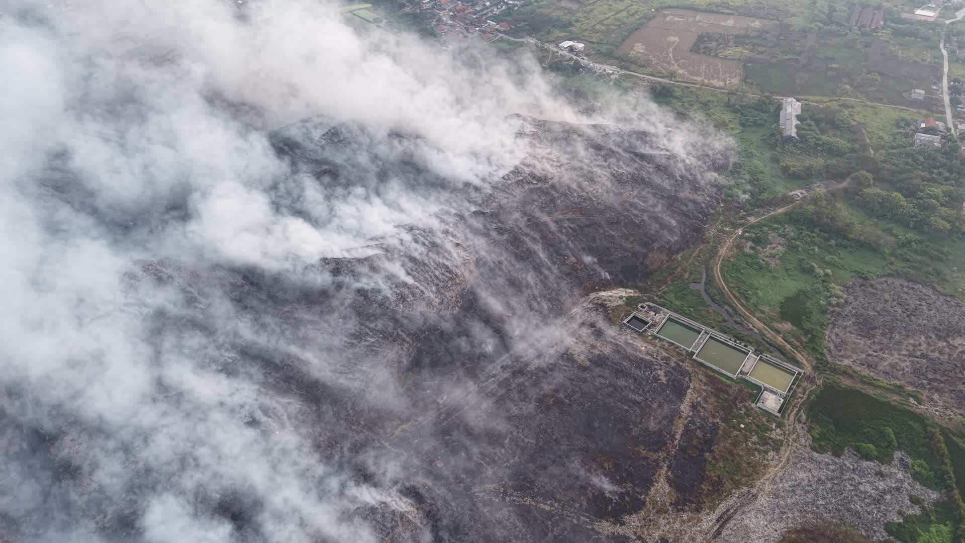 fire of big landfill in Indonesia