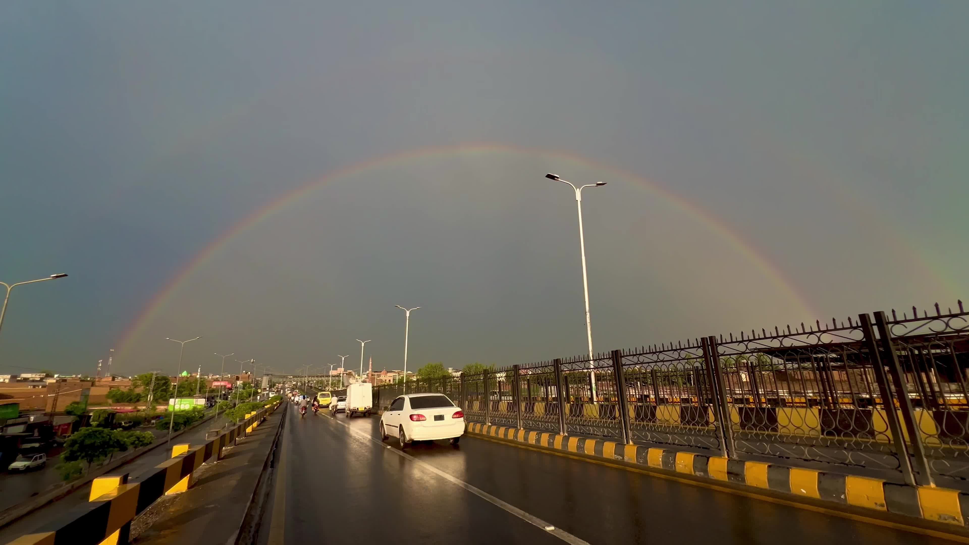 Pakistan: Rainbow Arches Over Peshawar Following Light Rainfall