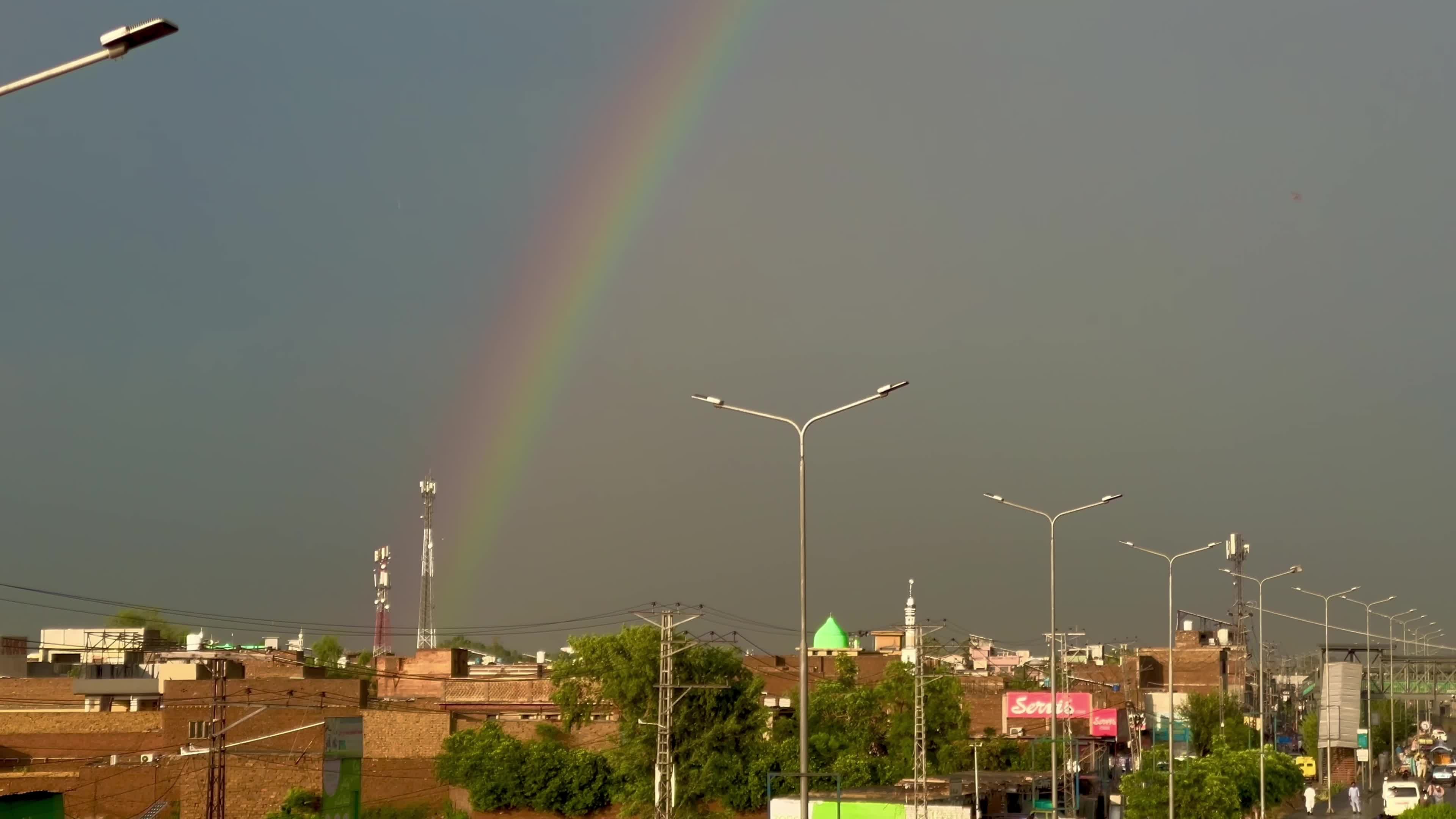 Pakistan: Rainbow Arches Over Peshawar Following Light Rainfall