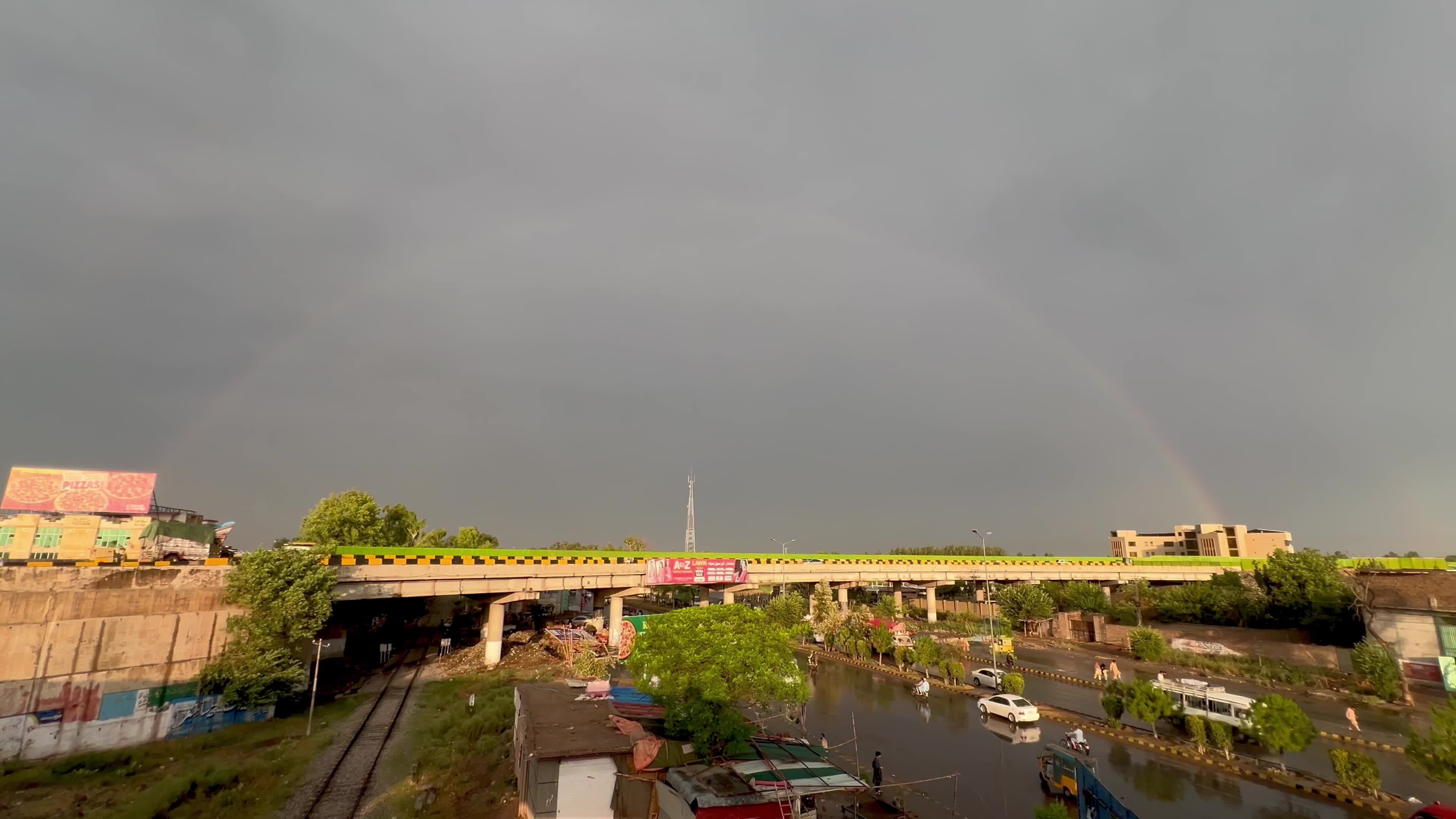 Pakistan: Rainbow Arches Over Peshawar Following Light Rainfall