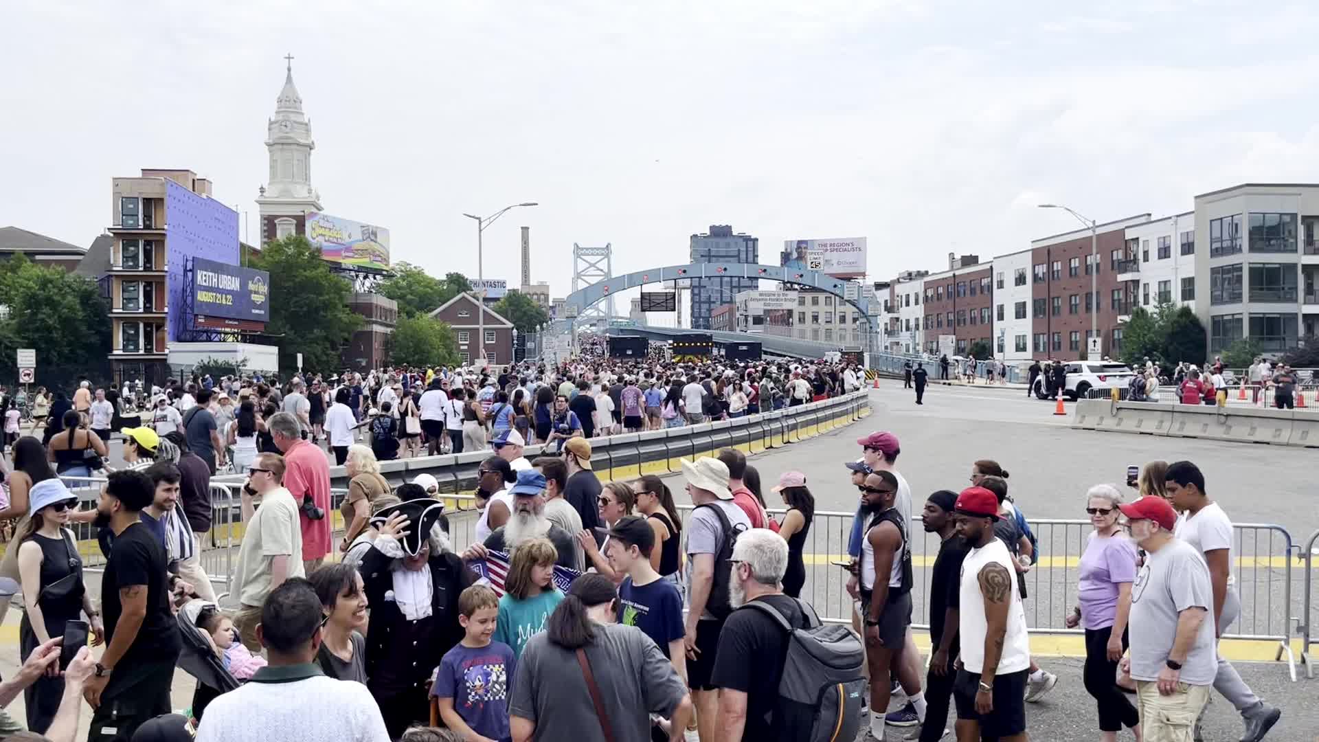 People Walk the Benjamin Franklin Bridge to celebrate 100th Anniversary