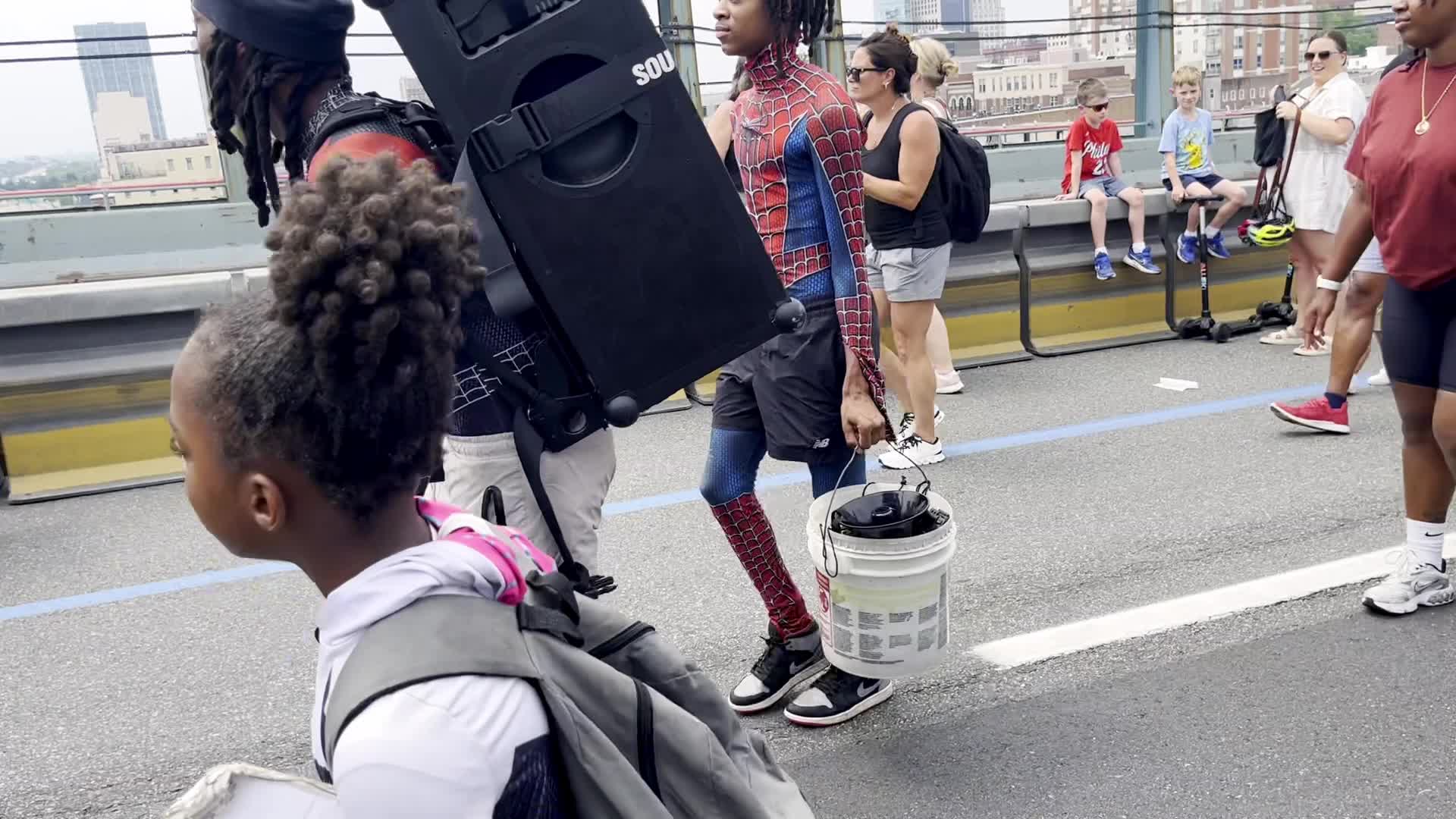 People Walk the Benjamin Franklin Bridge to celebrate 100th Anniversary
