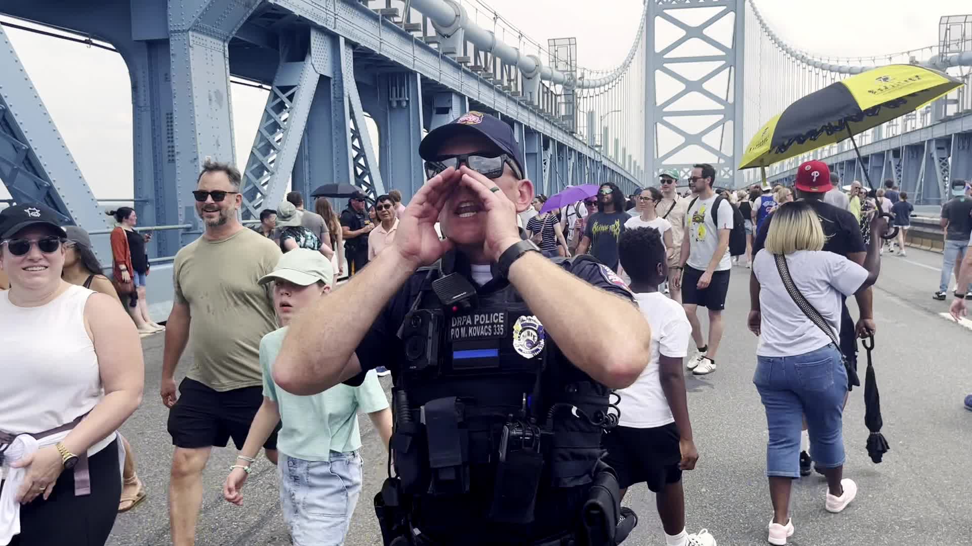 People Walk the Benjamin Franklin Bridge to celebrate 100th Anniversary