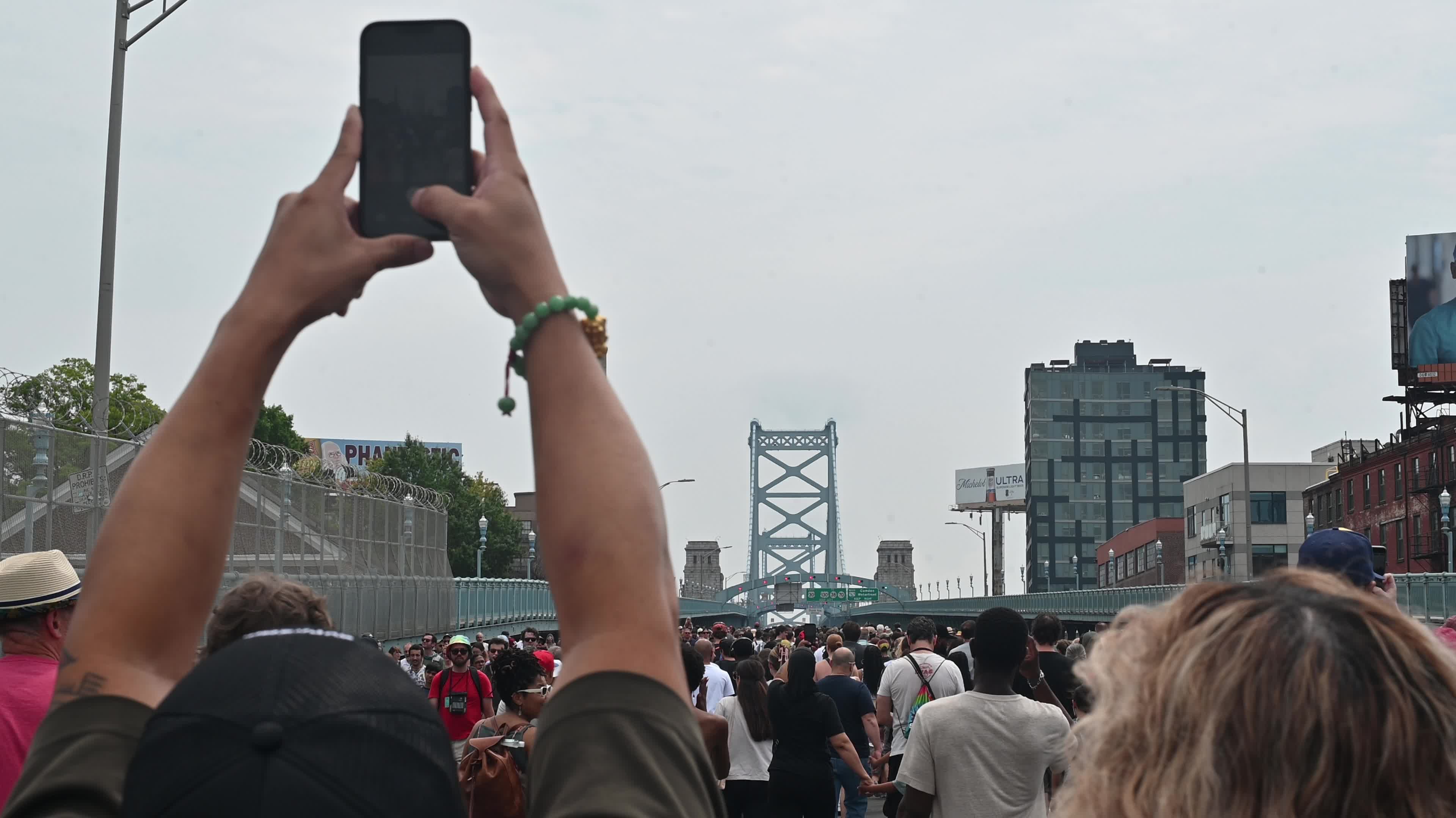 People Walk the Benjamin Franklin Bridge to celebrate 100th Anniversary