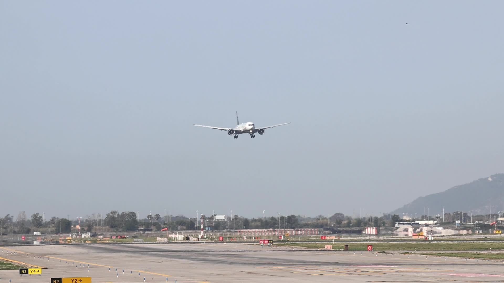 An Air Canada Boeing 777 with a special livery lands at Barcelona Airport