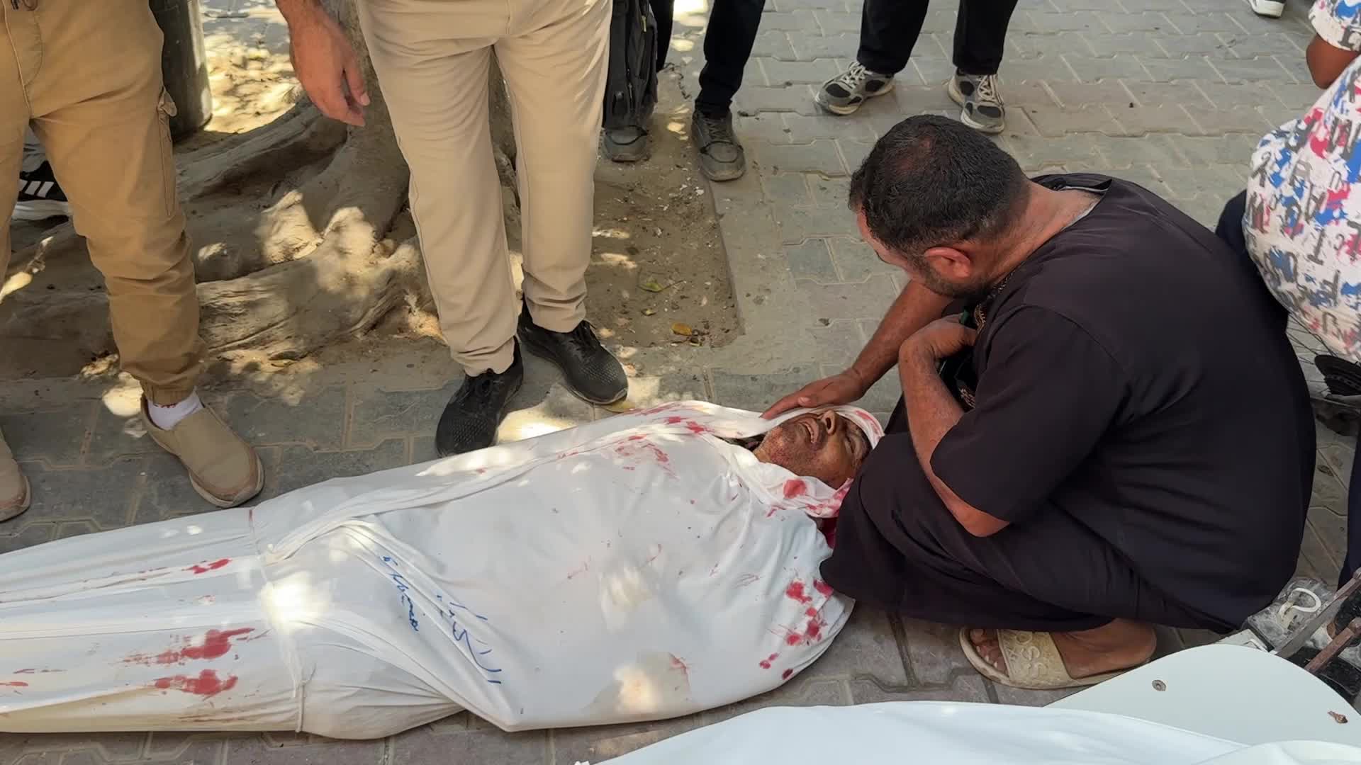Mourners participate in the funeral of six Palestinian police officers in Gaza City