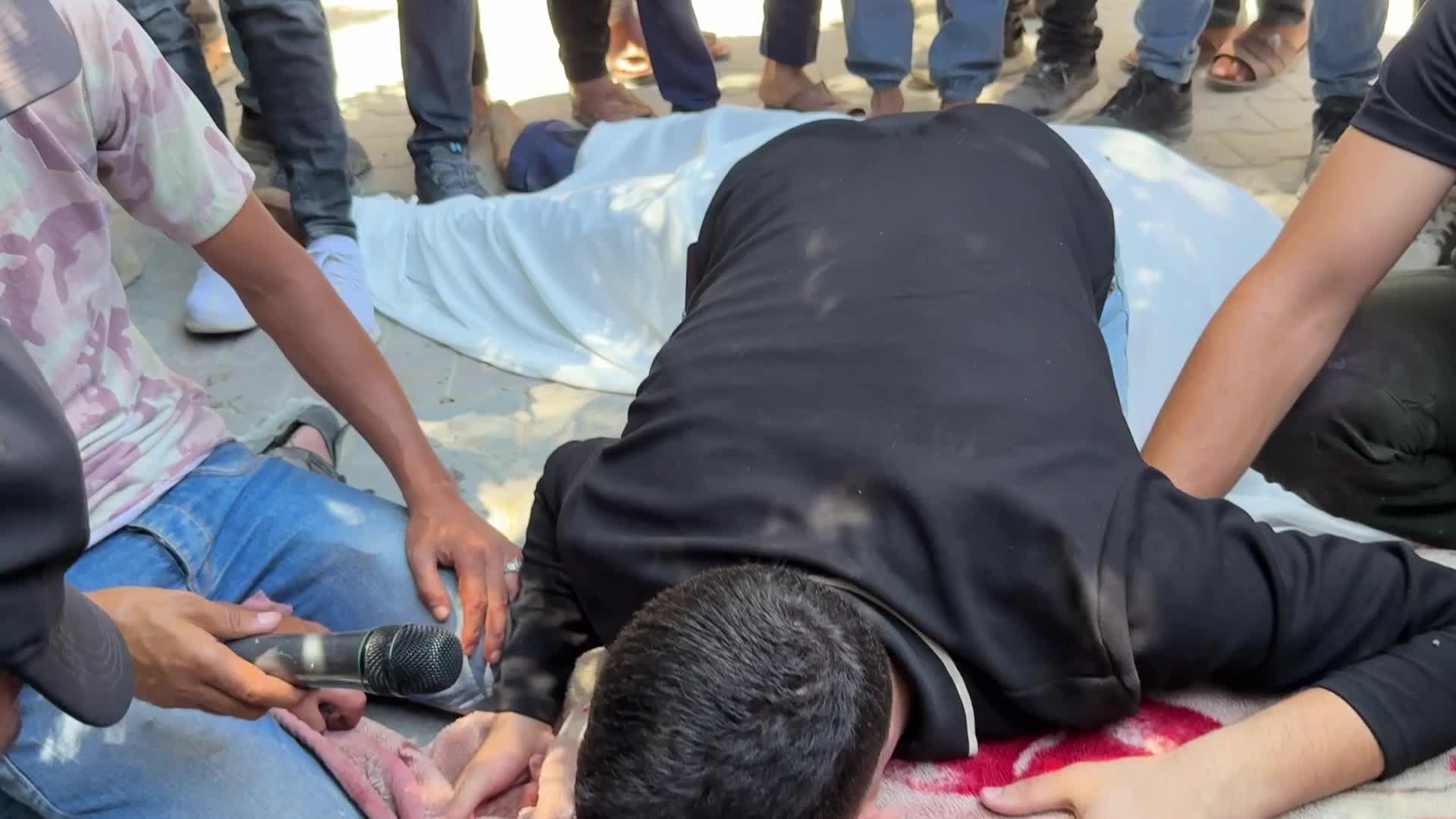 Mourners participate in the funeral of six Palestinian police officers in Gaza City