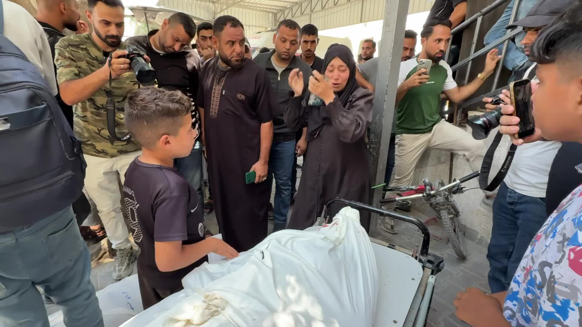 Mourners participate in the funeral of six Palestinian police officers in Gaza City