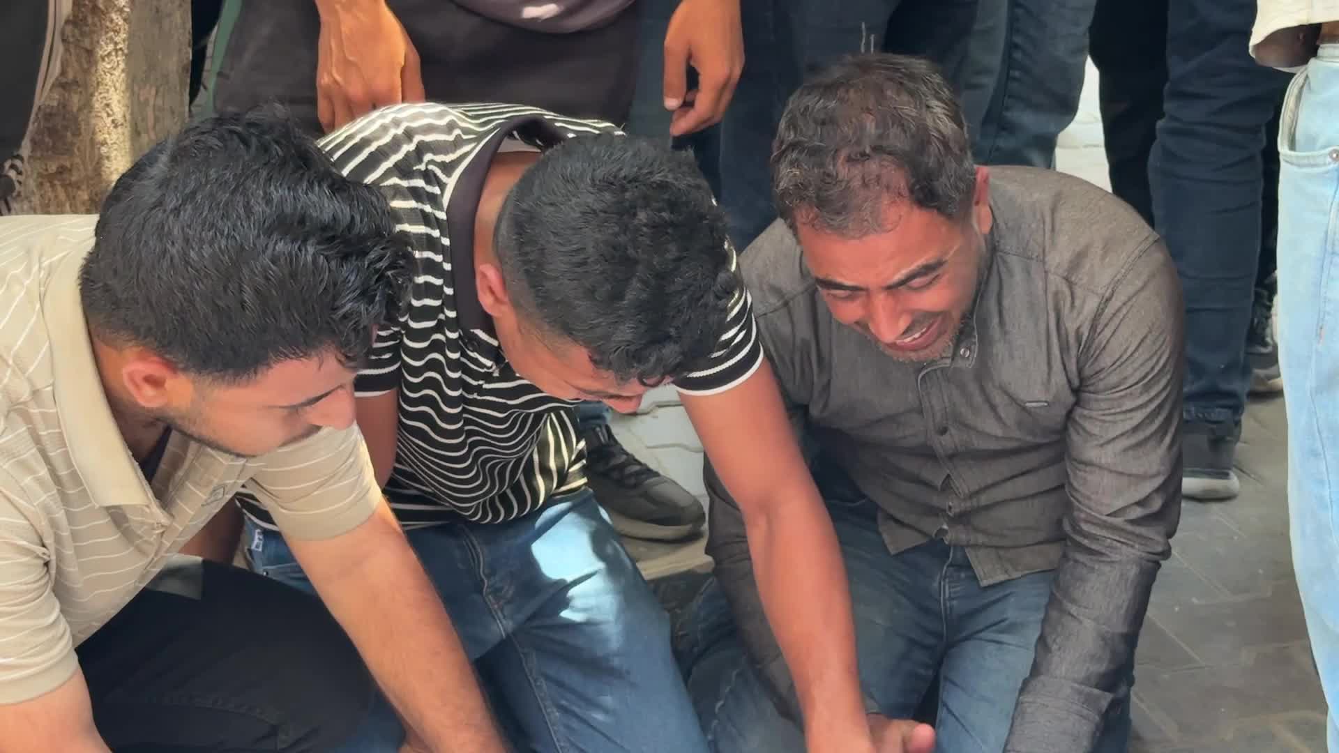 Mourners participate in the funeral of six Palestinian police officers in Gaza City