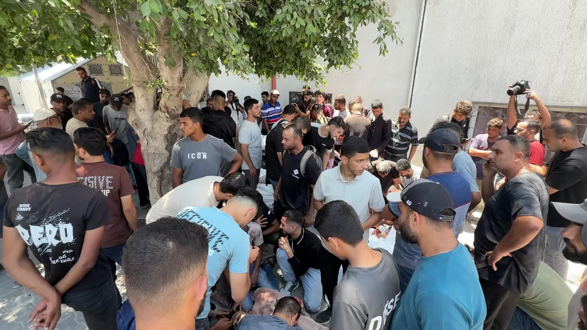 Mourners participate in the funeral of six Palestinian police officers in Gaza City
