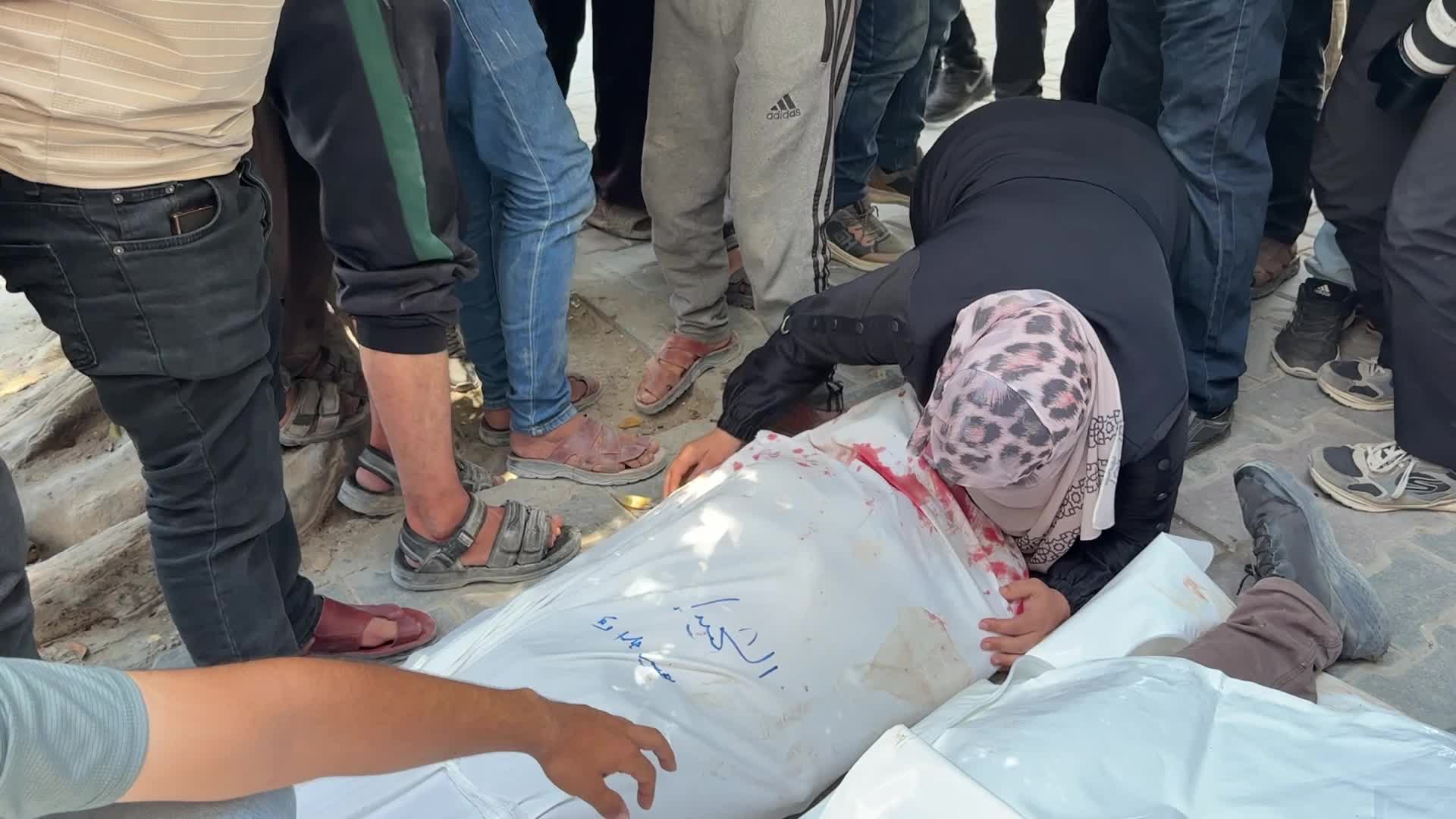 Mourners participate in the funeral of six Palestinian police officers in Gaza City