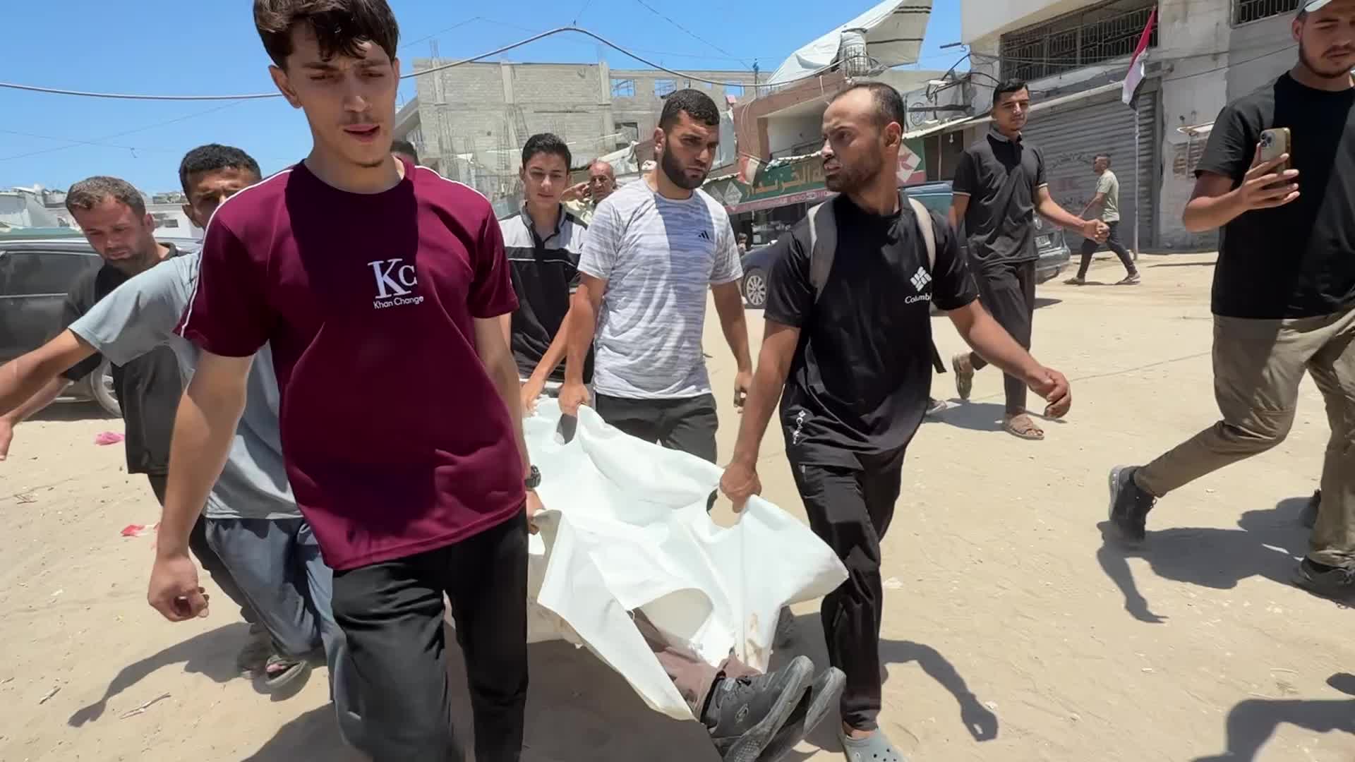 Mourners participate in the funeral of six Palestinian police officers in Gaza City