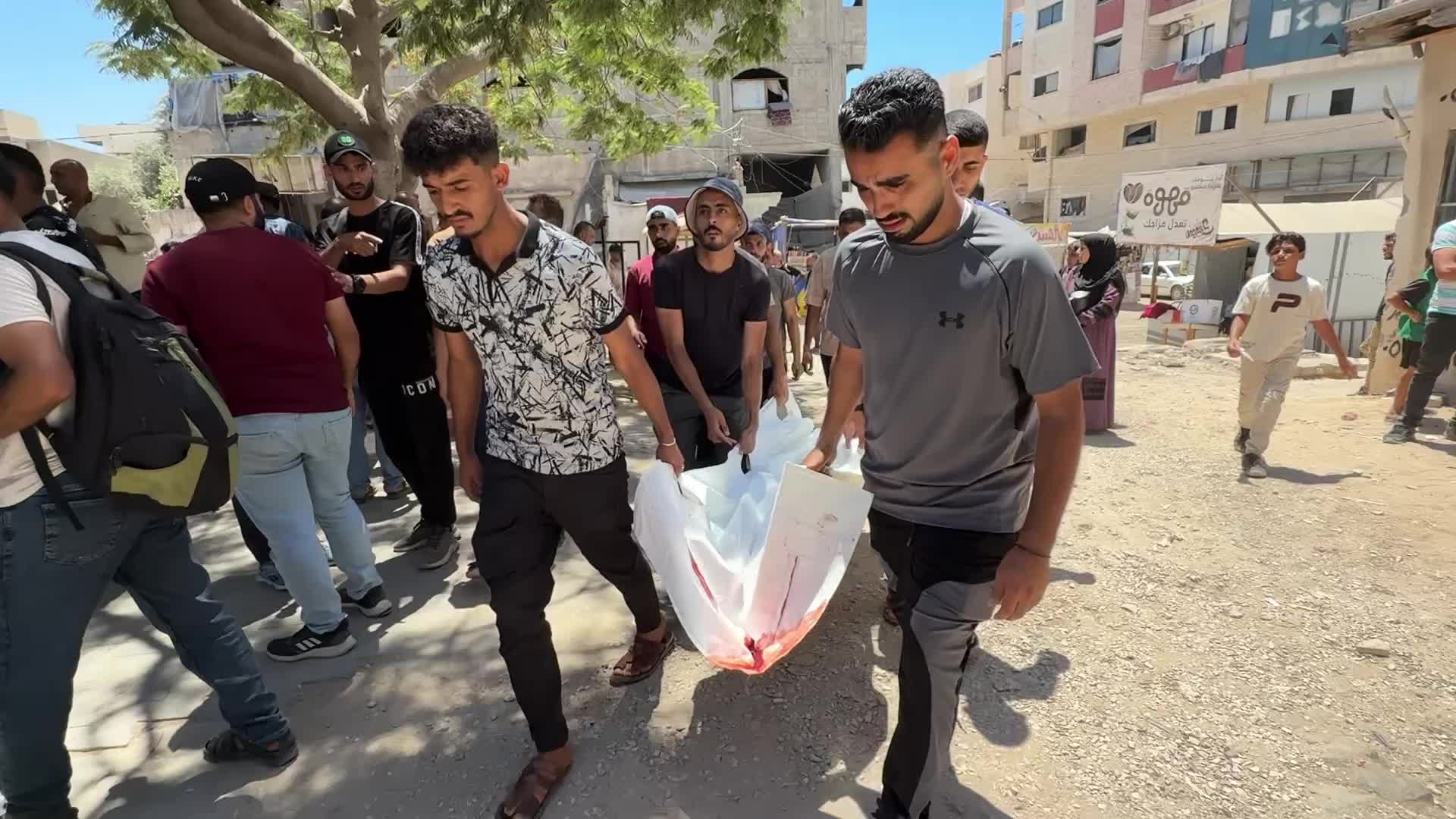 Mourners participate in the funeral of six Palestinian police officers in Gaza City