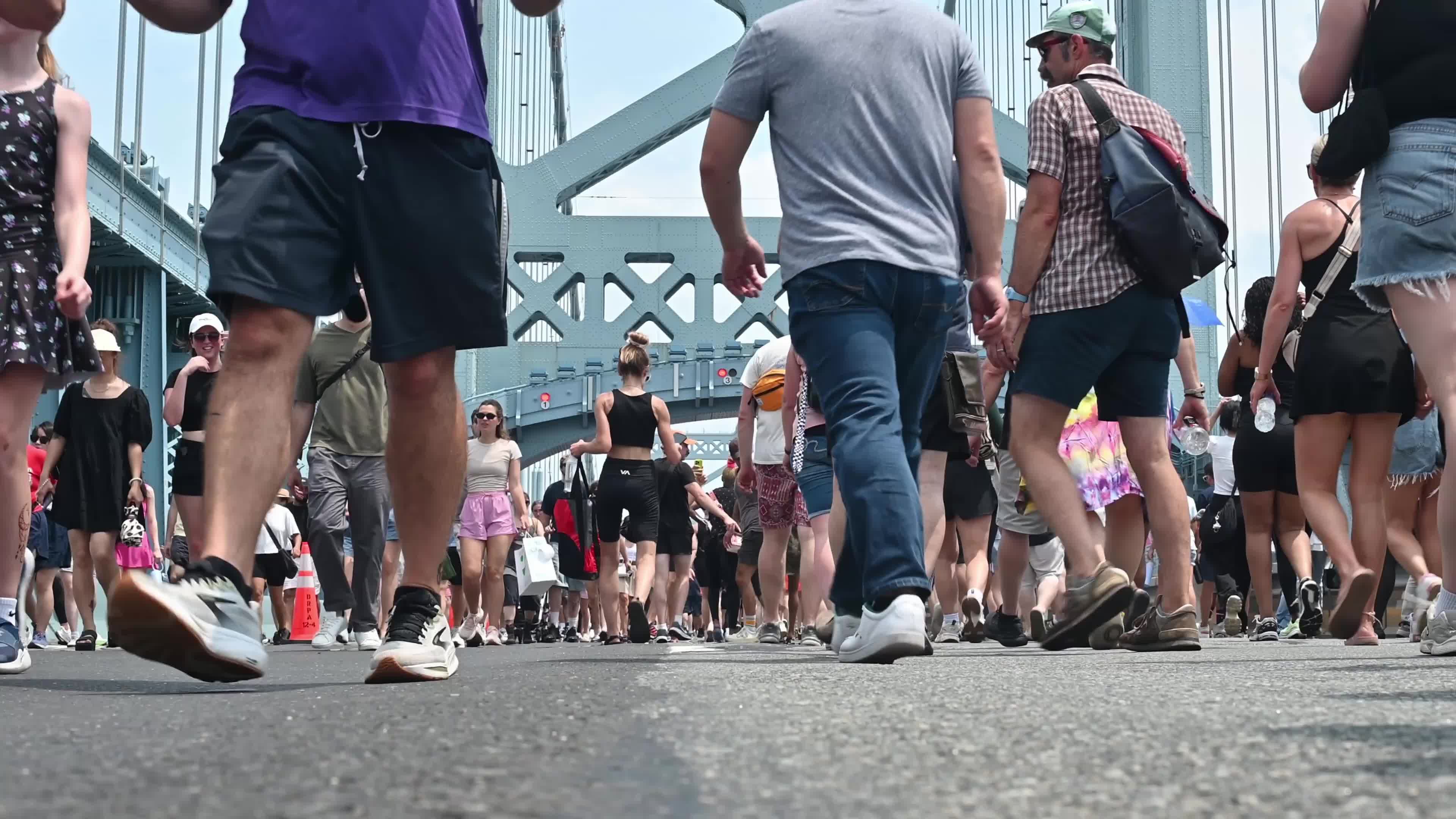 People Walk the Benjamin Franklin Bridge to celebrate 100th Anniversary