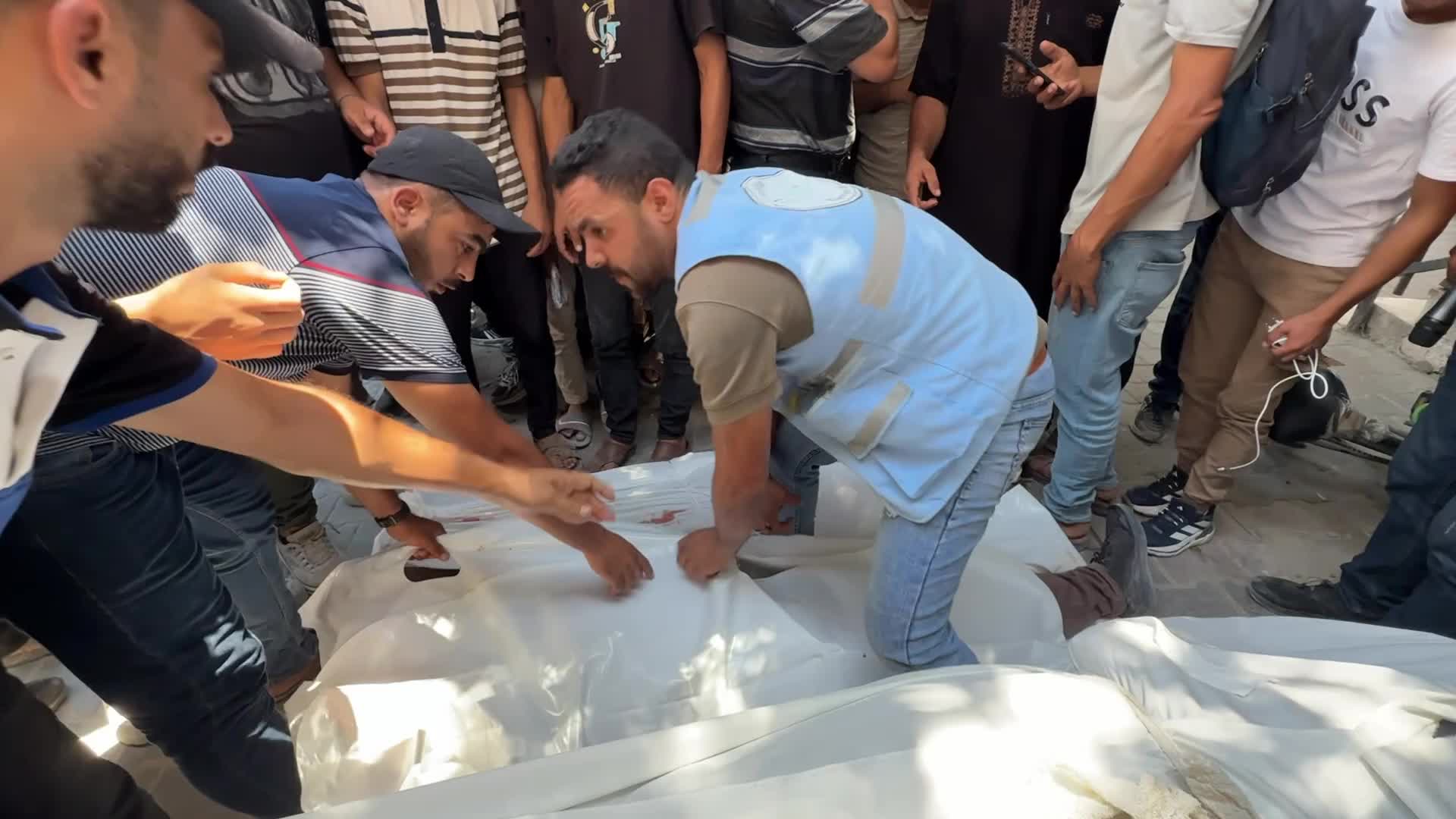 Mourners participate in the funeral of six Palestinian police officers in Gaza City