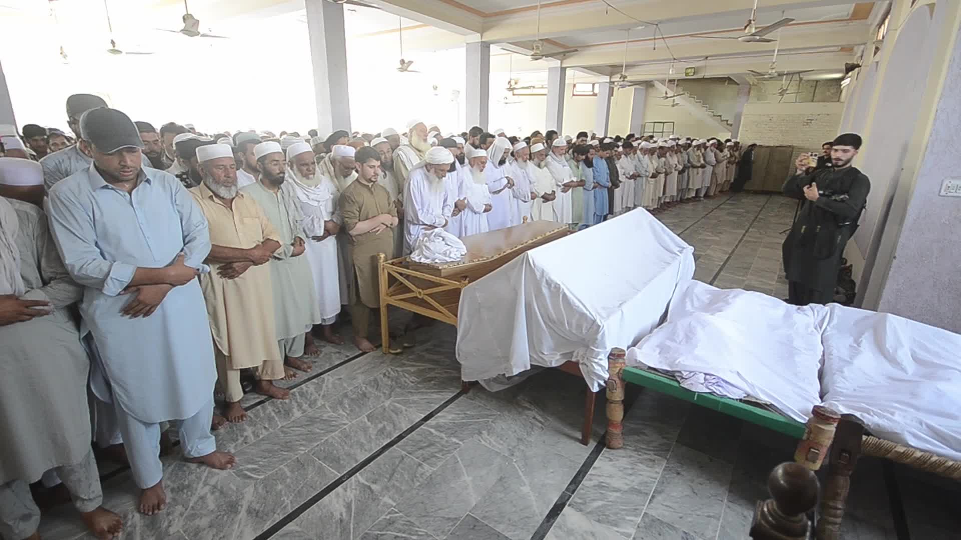 Funeral Held for Family Killed in Peshawar House Fire